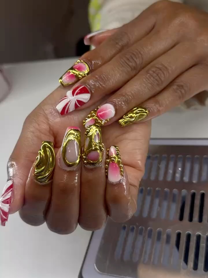 Gold on gold with a pop of red🎄❤️ by Amirah
#LuxuryNails #GoldChromeNails #HolidayNails #NailArtDesign #Brownsugarnailspa