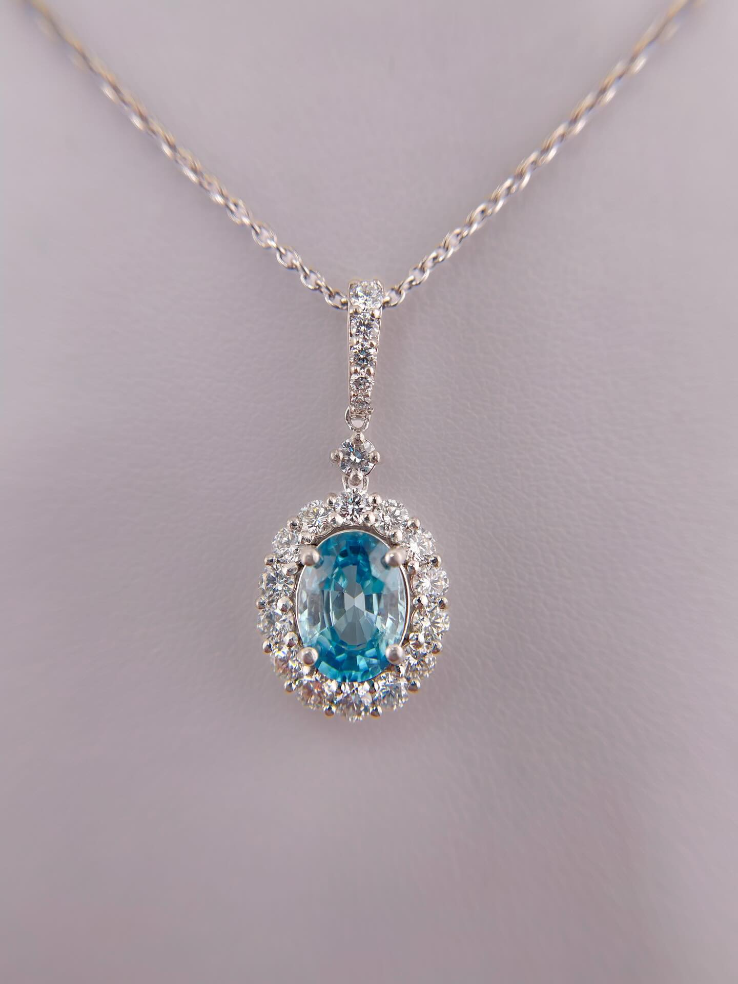 New HJ Signature piece! Luminous blue 2 ct. ZIRCON set in platinum, surrounded by .8 ctw. diamonds.
A Zircon can be dated to 4.4 billion years old, making it the oldest known material ever discovered on Earth…And the ideal gemstone for legacy jewelry— timeless pieces generations will cherish.
#zircon, #zirconpendant, #platinum, #legacy, #heirloomjewelry, #diamonds, #timeless, #shopsmall, #nhjewelers, #newhampshire, #Holidays, #livefreeandshine #christmas, #nh, #hampsteadnh, #sandownnh, #plaistownnh, #atkinsonnh, #exeternh, #kingstonnh, #salemnh
