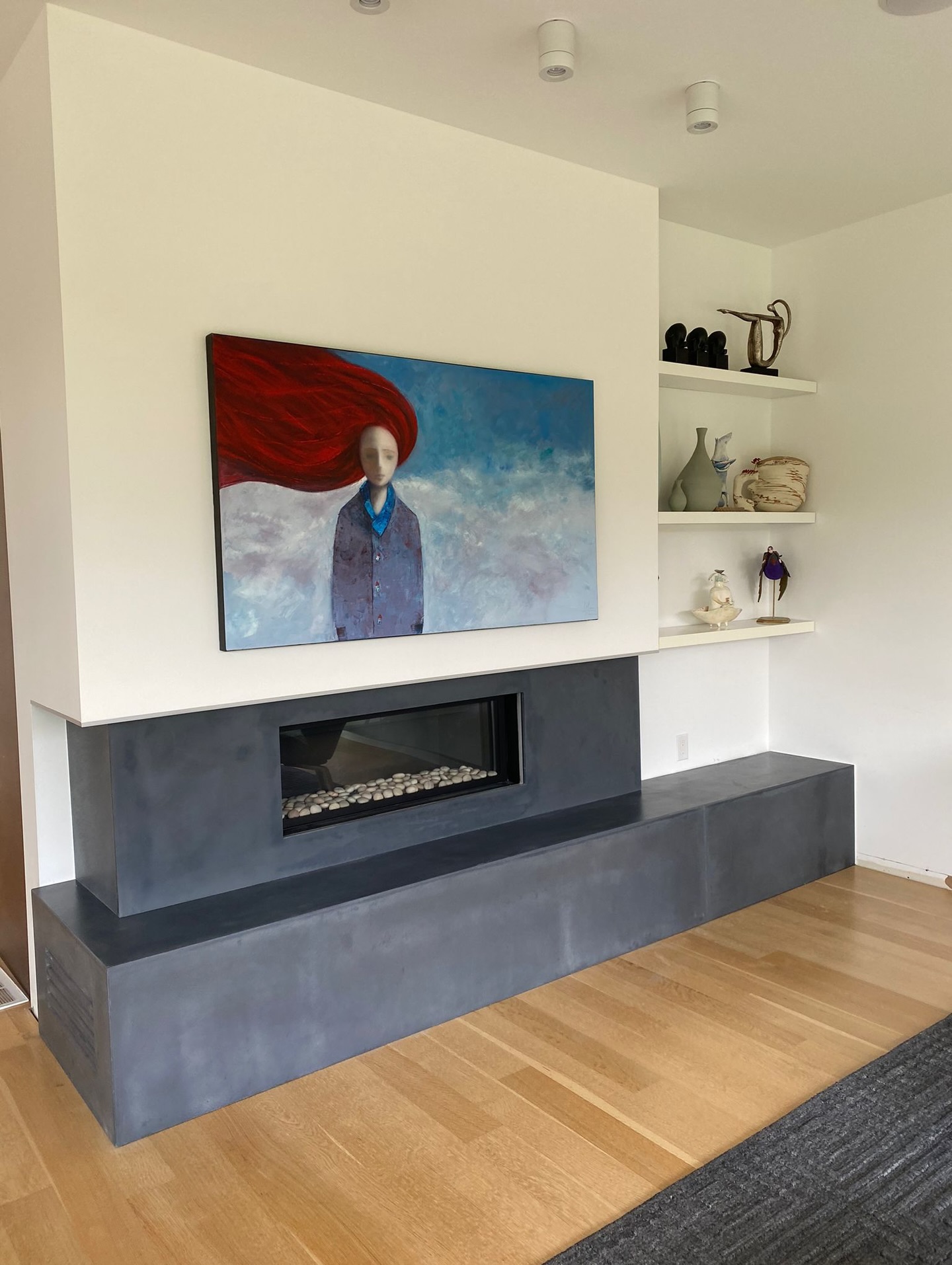 A custom charcoal-toned concrete fireplace surround, fabricated and installed to seamlessly anchor this space.
Designed with integrated heat-escape vents to allow warmth to disperse naturally while maintaining a clean, monolithic aesthetic.
Where function, craftsmanship, and modern design meet.
Handmade. Purpose-built. Timeless.
.
.
#InteriorDesigner
#InteriorDesignStudio
#ArchitecturalDesign
#DesignProfessionals
#ResidentialDesign