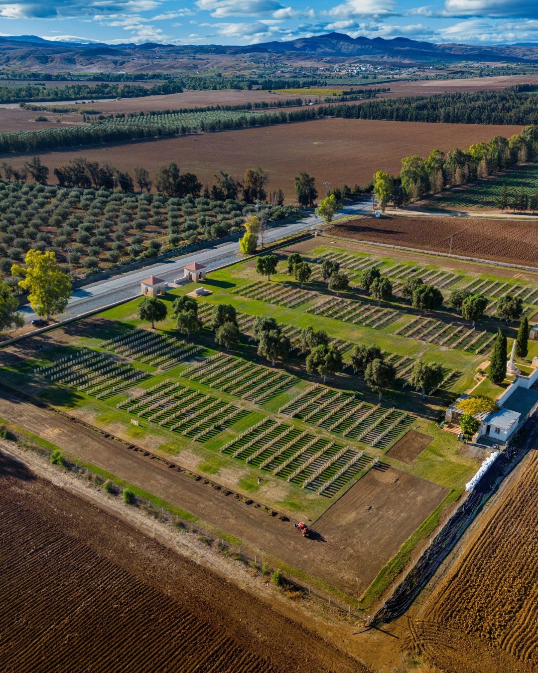 Some great drone shots of our project for the Medjez-El-Bab Commonwealth War Graves Commission in Tunisia.
As you can see, a lot of the lawn has been lifted in preparation for tree planting, which has now begun and is super exciting!
The site is gradually coming to life with Olive, Bitter orange, Pomegranate and Jacaranda trees.
If you go back 5 posts you can see the renders of our vision and how the site will look once works are complete!
And you can read more about the project in one of our most recent blogs – link in bio.
⸻
ABOUT: Joe Perkins Design is a multi-award-winning landscape design consultancy, creating innovative outdoor spaces that celebrate the environment, wildlife, and biodiversity. Working across the UK and internationally, we partner with clients who share our passion for sustainable and visionary design. Discover more about our work at: www.joeperkinsdesign.com