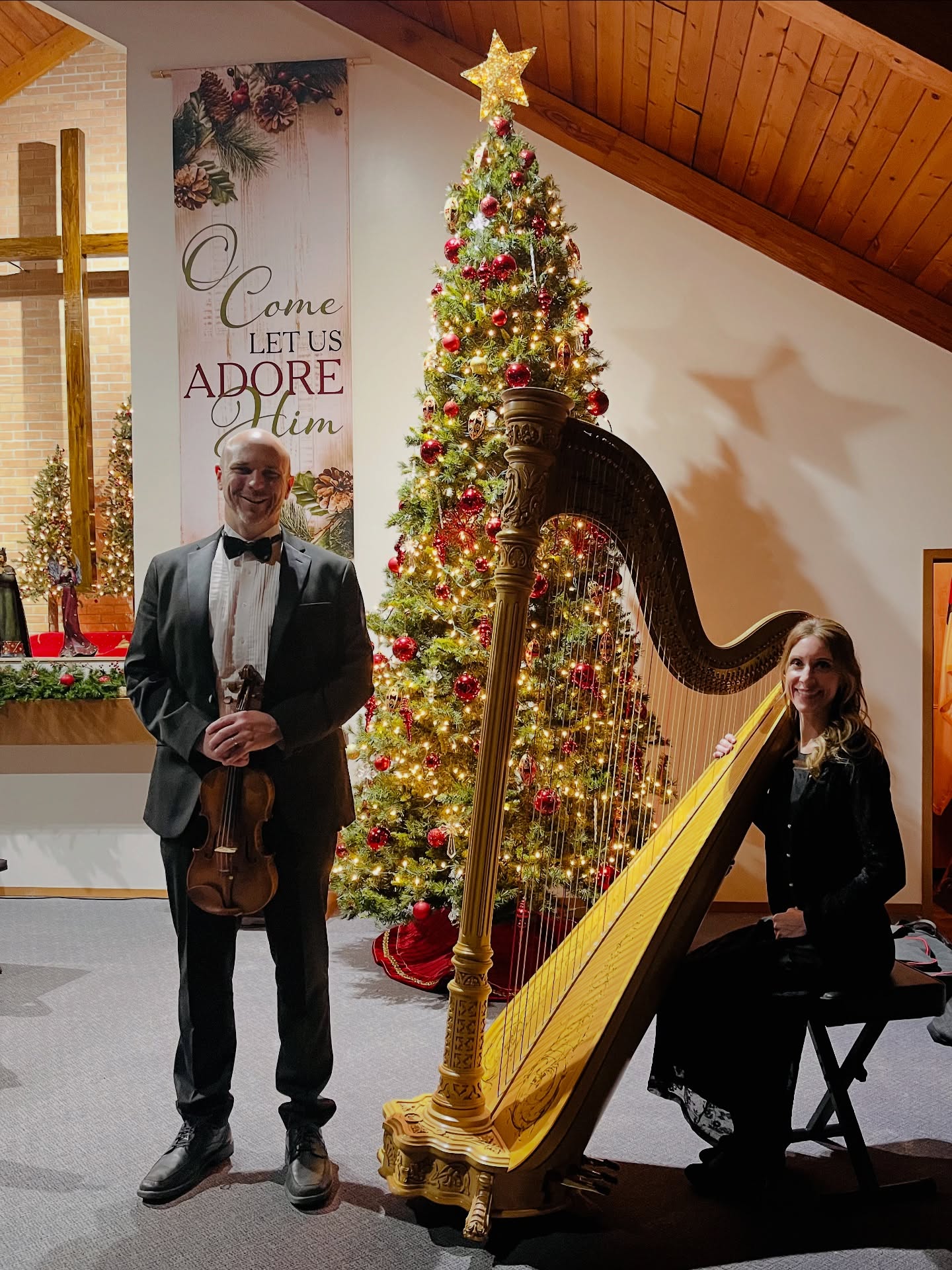 So behind on posting because this Holiday season has been so full of music 🎄✨
I’ve been running from one beautiful event to the next and have loved every minute - now I need to get caught up and share all of it!
Tonight, Ian and I had the joy of playing special music for a Candlelight Christmas service at Bainbridge Church of Christ. Such a peaceful, meaningful, and lovely service to be part of ♥️ 🕯️
#ChristmasMusic #HarpAndViolin #CandlelightService #BusyButGrateful #HolidayMusician #ChurchMusic #LiveHarp #ViolinAndHarp #ChristmasSeason #SoMuchMusic #bainbridgechurchofchrist