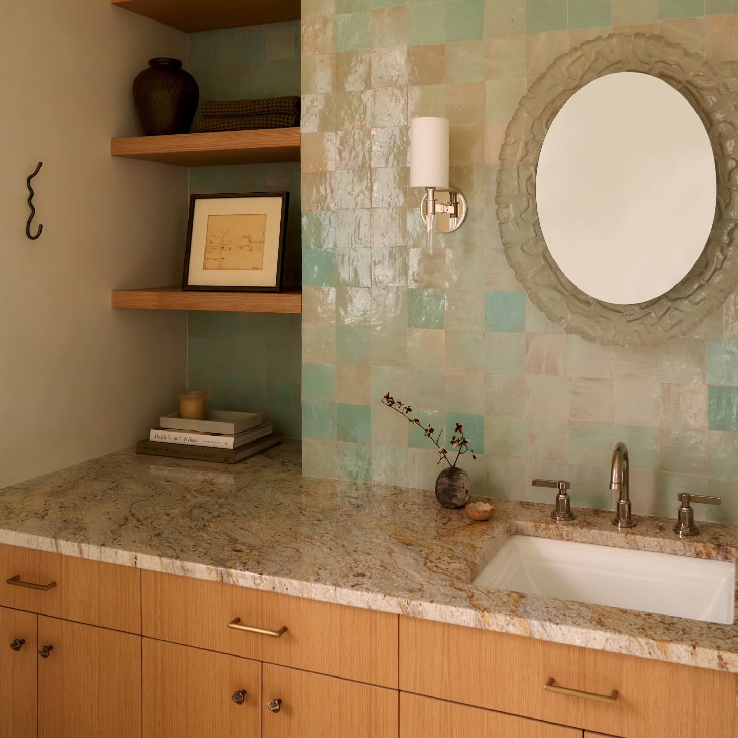 Where would you rather freshen up?
An earthy, sun-kissed powder room with warm tones, playful tile, and an effortlessly serene feel or a moody bathroom with a sleek marble counter and rich dark walls? Either option sounds good to us 🙌
#lorlastudio #powderroomdesign #bathroominspo