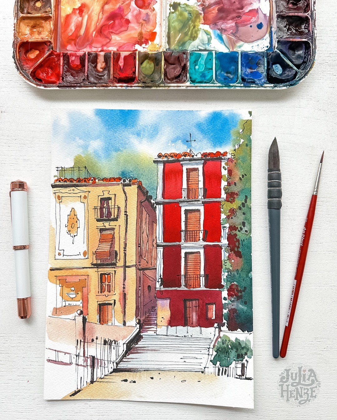 🎉 NEW SKILLSHARE CLASS!
A few weeks ago I shared a sketch from Granada that I made right there on location, on one of a busiest spots of the city. And your responses were so lovely. So many kind comments, DM’s, compliments. Thank you so much!❤️ And there were a few very practical questions about my color choice and the process.
So I thought that it might be helpful to create a class and show you exactly how I work.
So today, I released a new @skillshare class: Urban Sketching in Ink & Watercolor: Confident, Colorful, Expressive.
In this class, I walk you through my full process, step by step. From a simple pencils sketch to an expressive artwork with ink and watercolor. We focus on clear shapes, bold but thoughtful color choices, and lines that feel confident without being stiff.
As always in my classes, it’s not about perfection, it’s about learning how to trust your choices a little more, and letting your sketches feel alive👩🏻🎨
If you’ve been curious about how I approach color and technique, this class is for you.
You can find it now on Skillshare (🔗 link in bio)
Happy sketching and let me know what you think!❤️
#urbansketchingtutorial #inkandwatercolor #expressivesketching #urbansketchingclass #learnurbansketching #sketchingprocess #confidentsketching #colorandline #artlearning #skillshareclass #skillsharetopteacher #skillshare #skillshareart #onlineartclass #sketchingconfidence #watercolorpractice #juliahenze #bravebrushes #sketchingclub