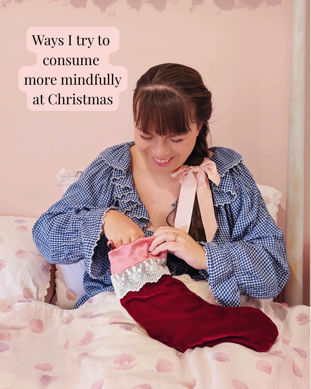 Ways I try to consume more mindfully at Christmas
A few years ago I made stockings (silk of course!) which are a bit smaller than normal stockings
This means less worrying about filling and more buying thoughtful small gifts to go inside
I buy some second hand gifts. We have a great local second hand bookshop with DVDs too. I’ve been buying classic favourite films on DVD for when they aren’t available on streaming. These are usually £2-3 each but often a really thoughtful gift.
We plan out our meals in advance so there no “but what if we suddenly want a lasagna!” panic buying of food
We have a family Trello where we can put links to gifts. Outside of my mum and husband, we stick to a couple of presents.
I usually make some gifts too. The best way to make sure these happen is to start planning before you even think you need to start!
This year I’ve started buying some reusable gift bags. I’d like to buy and make a few each year to try and keep gift wrapping waste down.
And of course, I buy from other small businesses. I’ve tagged a few of my favourites or ones I have bought from this year without hopefully giving away what I’ve bought!
Image description- 8 images of Jo, a white woman in her mid thirties, sitting in bed wearing a navy checked nightie and pink hair bow holding either a pink silk Christmas stocking or red velvet Christmas stocking and the above caption text added on top