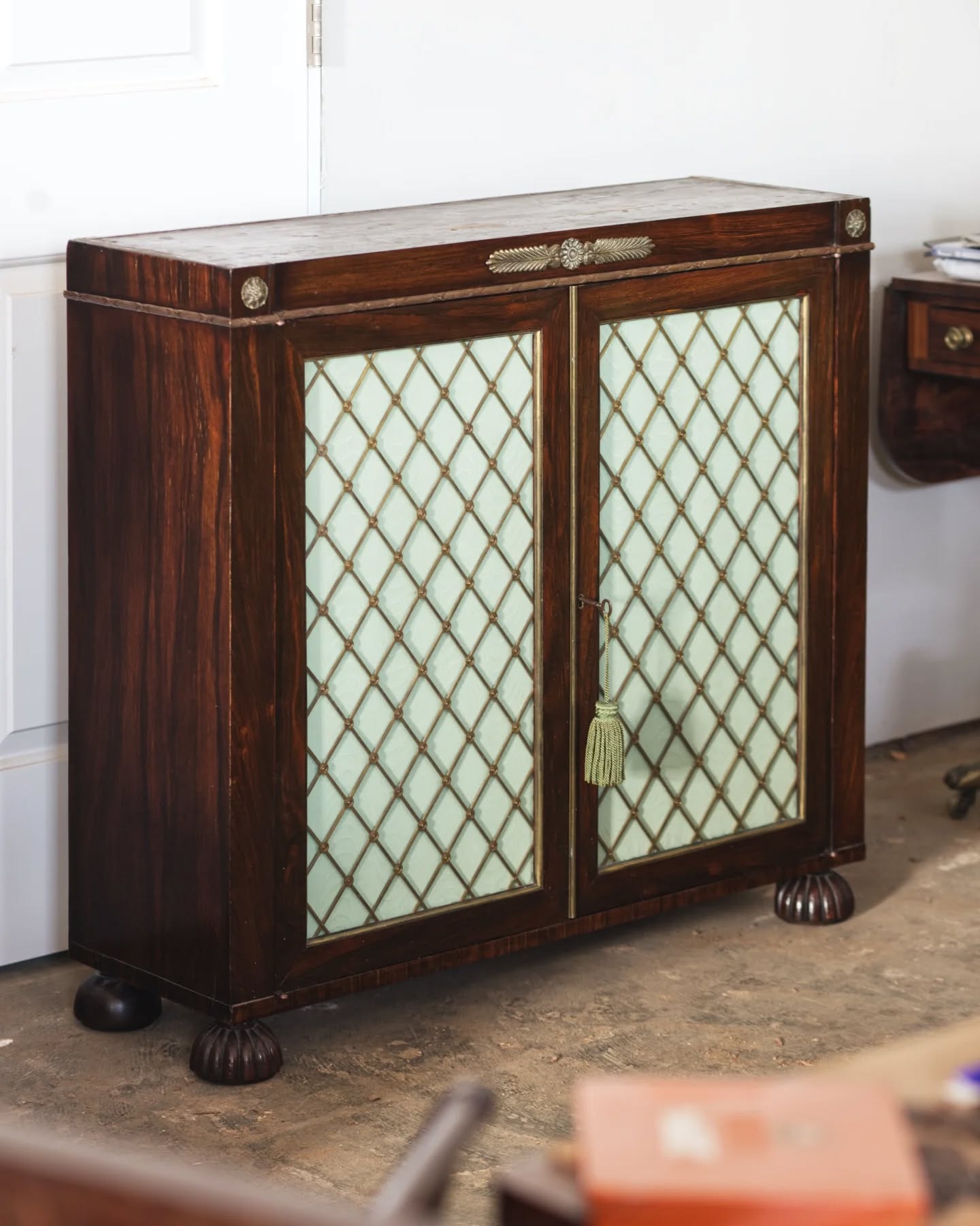 A rosewood cabinet altered to accommodate a television...
Aside from adding a hole in the back for cables, the doors even fully open would block the view of the screen. The solution was to replace. The existing knife hinges with knife hinges that have an offset pivot point. What should have been a fairly simple job ended up having lots of little tweaks to when you consider that almost nothing was truly square and the doors have a slight warp.
The doors now swing open wide in front of the pilasters and the exposed part of the hinges don't stand out too much.
#furniturerestoration #furniturerestorer #rosewoodcabinet #restoredinbaltimore