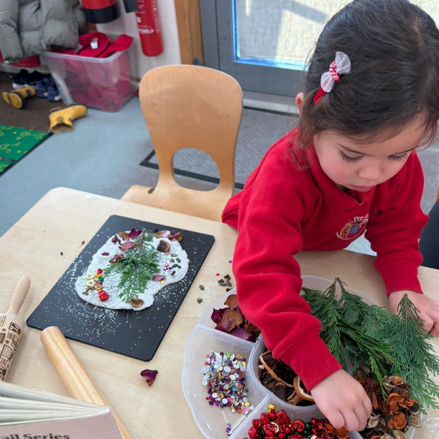 Christmas preparations have begun in earnest and the children are getting busy with festive fun!
Using clay as a base, they created Christmas trees and decorated them with natural foliage, cinnamon, dried orange, star anise, ribbons, bells and tinsel.
Our playroom smelled divine as the children carefully decorated their trees to be given as special Christmas gifts.
