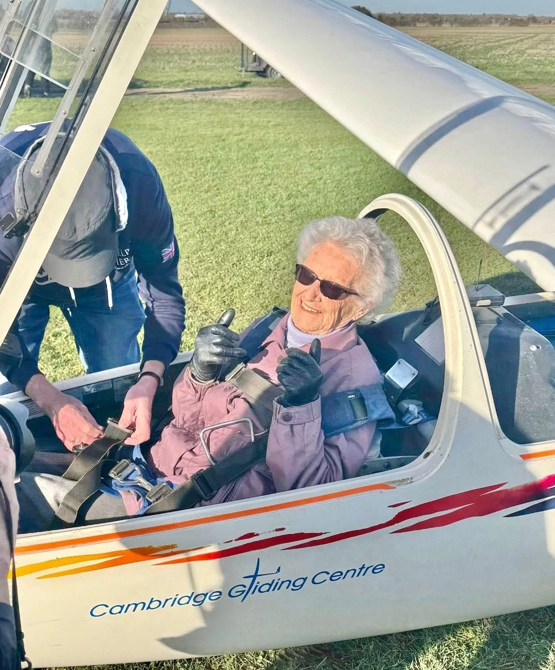 On Saturday 13 December, 102-year-old WWII veteran, Robbie Hall, who served with Bomber Command, realised one of her long-held dreams as she enjoyed a breathtaking glider flight above Cambridge.
The unforgettable experience was made possible by the Cambridge Gliding Centre, whom the Taxi Charity first met at North Weald Airfield on Remembrance Sunday. During that meeting, Robbie shared her love of adventure and explained that while the Taxi Charity had treated her to a Spitfire flight last year, she would love to fly again - this time in a glider.
The Cambridge Gliding Centre immediately offered to make that wish come true, generously providing Robbie with a complimentary flight. With perfect weather conditions on the day, Robbie was able to enjoy breathtaking views and a peaceful journey through the skies - she even took over the controls.
Robbie was accompanied to the airfield by Taxi Charity ambassador Kaye Gladden Thorpe and her husband Al, ensuring she was supported throughout the day.
Kaye said: “Seeing Robbie take to the skies at the age of 102 was incredibly emotional. She has such a love of life and adventure, and this experience meant the world to her. We are hugely grateful to the Cambridge Gliding Centre for their kindness and generosity in making this special day possible.”
David Guest, from the Cambridge Gliding Centre, said: “The Club saw it as an absolute privilege to welcome Robbie to our airfield and give her the opportunity to fly with us. Her story, her spirit and her service are truly inspiring, and we were honoured to play our part in creating such a memorable experience for her.”
Colin Mills, chairman of the Taxi Charity, said: “The Taxi Charity for Military Veterans would like to extend its heartfelt thanks to the Cambridge Gliding Centre for their generosity, warmth and support, and for helping to create another unforgettable memory for Robbie.”
Visit our website for more great photos of Robbie taken from the glider cockpit and a video interview with the Express.