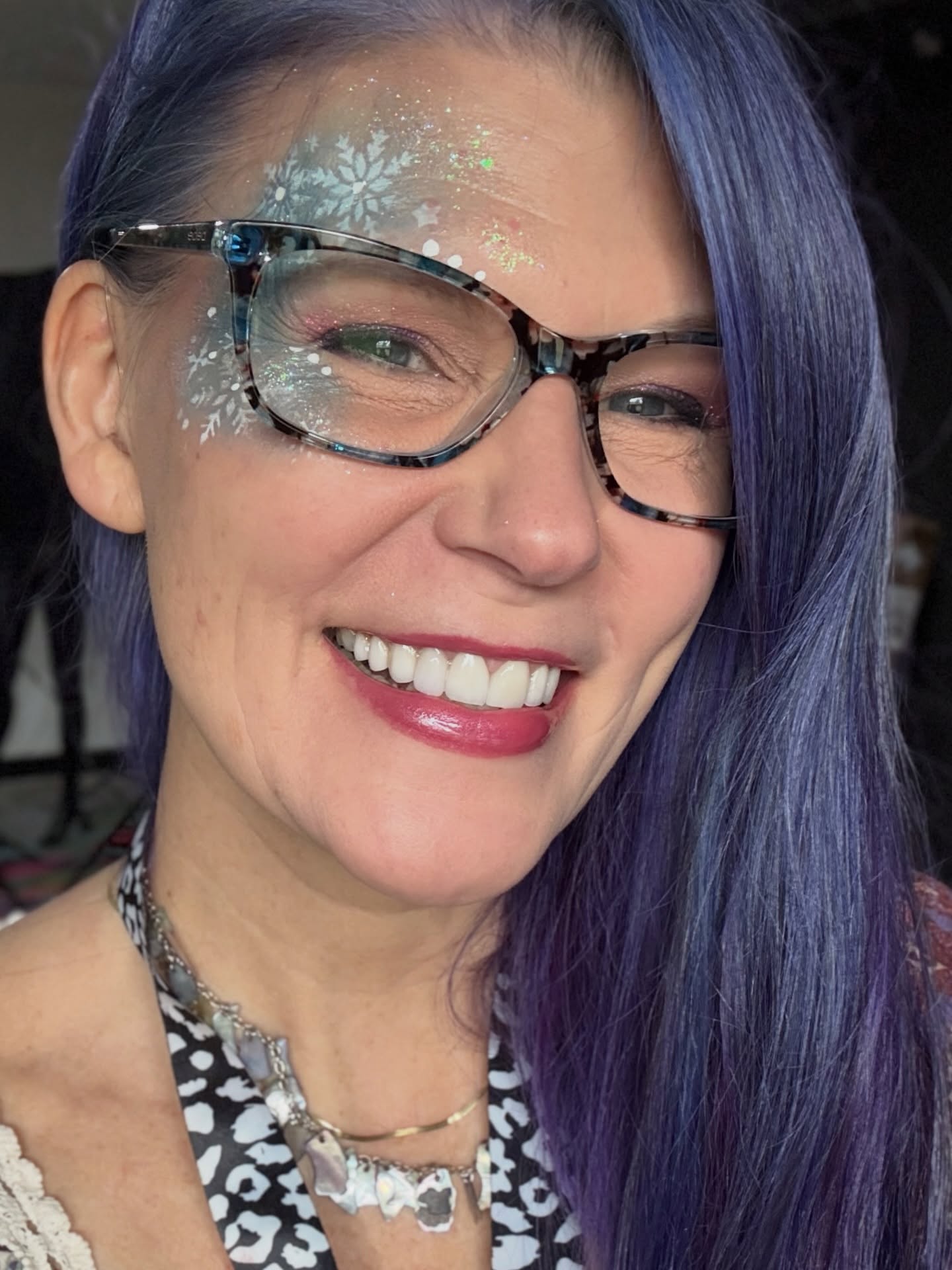 On Christmas Day, I had a photography assignment with the paper at a foster kids’ event. I had painted my face to be festive and thought about taking a small kit…but, decided not to as I was on assignment and I also didn’t ask the organizers.
Needless to say, I was happy to see 6 volunteers doing face painting. In all honesty, I was also sad to see the awful paint they were using, but I got over myself about it. I talked to the lead painter and she was delightful! She even offered me to sit and paint if I wanted. I declined to paint the kiddos….because of the products and I’m insured. BUT…..
…since I wasn’t allowed to photograph kid’s faces, I needed to get pics of the volunteers painting the kids. None of them had face paint on except for the lead painter. I offered to paint the volunteers and they were down for it! It gave me some great photos to use in the paper while also helping the volunteers feel more festive! Bonus points because in the process, I was able to show them how to use the products they did have!
They were so kind to volunteer their time for the kids on Christmas Day. Kudos to them for making it extra special for those less fortunate than others.