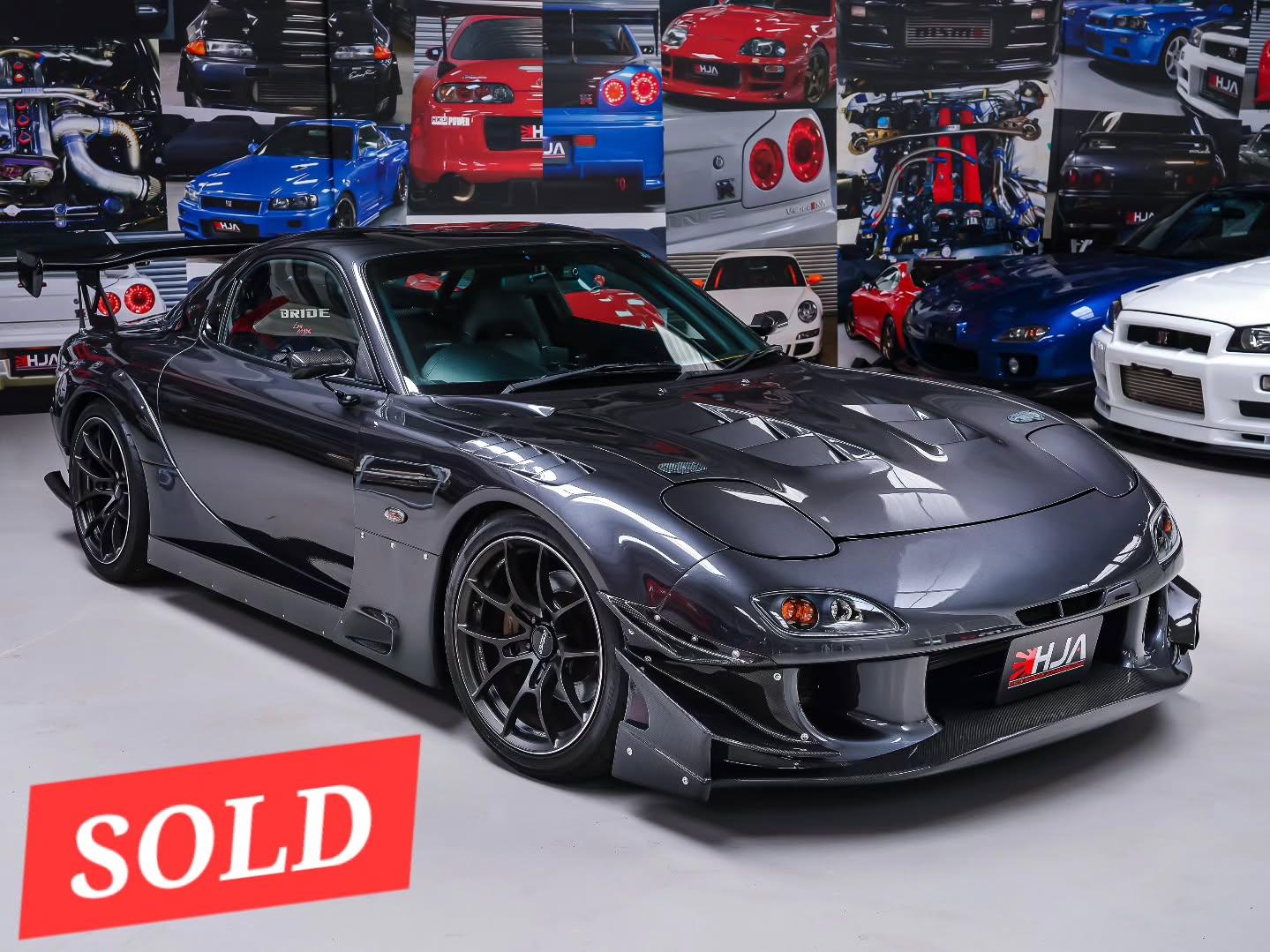 Stunning R-MAGIC BUILT MAZDA RX-7 TYPE RS now with its lucky new owner and his epic collection of JDM, Euro and American icons.
This is one of those rare RX-7s that instantly reminds you why the FD3S has become such an icon. Built by Pro Staff R-Magic— one of the most respected rotary specialists in Japan — and finished with a full suite of genuine RE Amemiya aero, this Type RS is a properly engineered, exceptionally clean, and beautifully sorted example of what a modern rotary build should be.
#rmagic #mazda #mazdaspeed #mazdarx7 #rx7 rx7club fd3s rotary wankel typers harlowjapautos hja jdm jdmlife jdmstyle boost boosted twinturbo turbo vortex bbs carbon rx7fd volkracing bridgeport typer alcon trackcar rx7fd3s