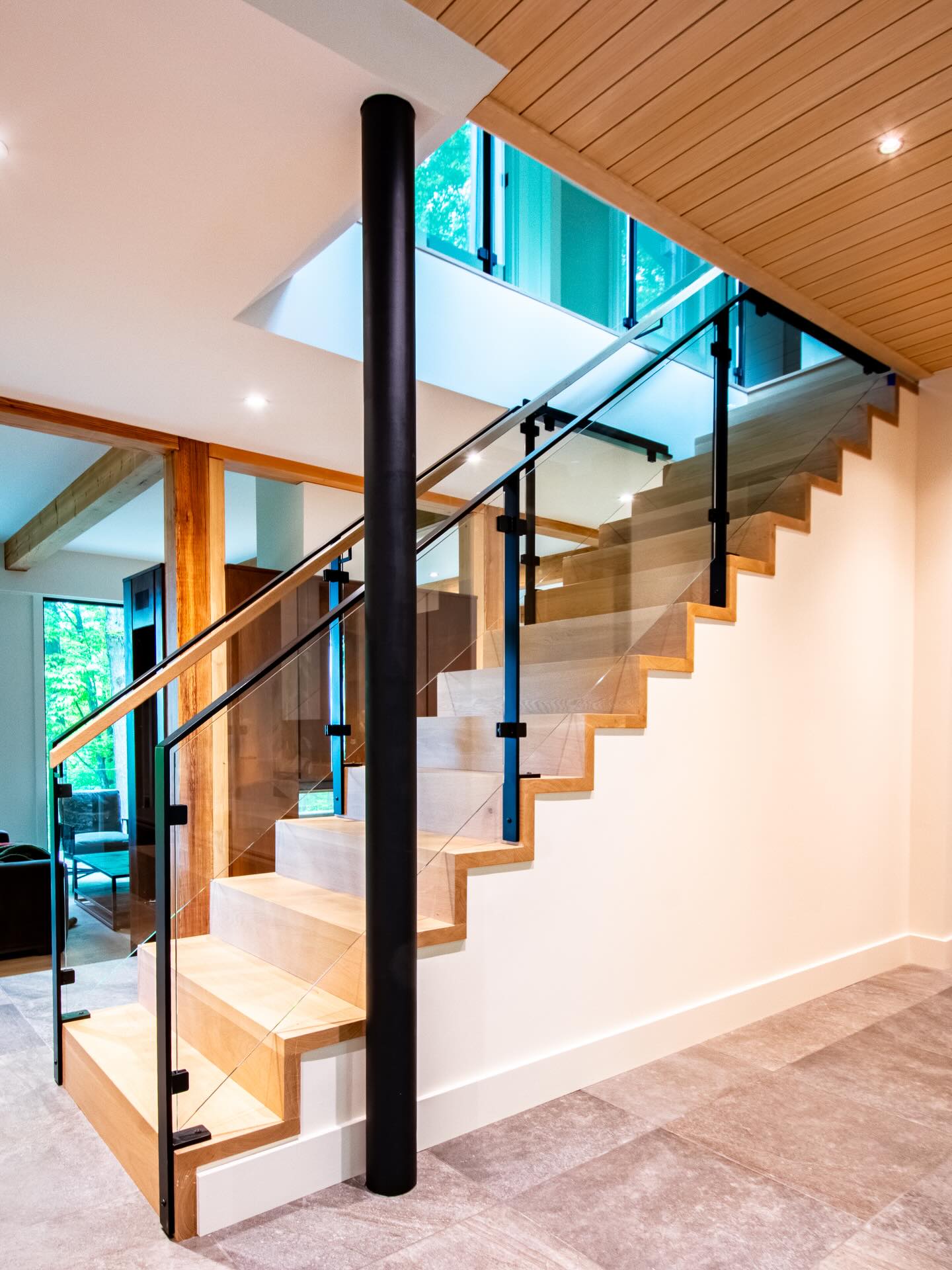 Here’s a railing we fabricated out of 1/2”x 2” cold rolled steel and integrated glass clips. We also welded on the handrail brackets for a seamless look which tied into the ceiling and the upper floor portion of railing. This was a little trickier than expected but the result was perfect. Thanks to @valleyview_construction and @travisbeachphotography for the great photos.