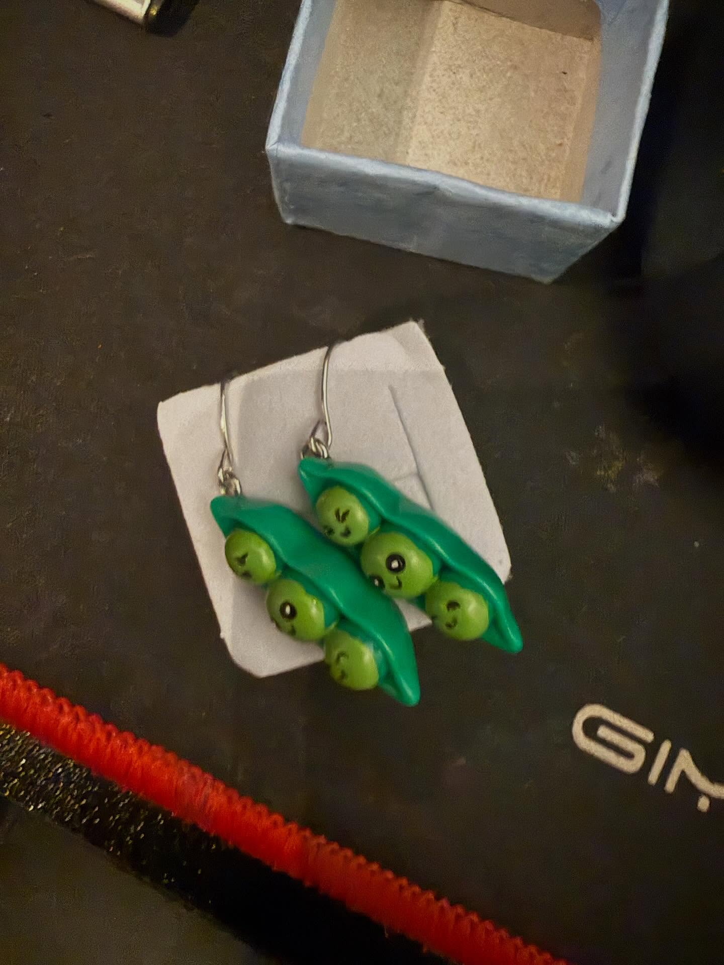 Absolutely loving the pea earrings bought for me as a Christmas present by one of my clients. 🫛