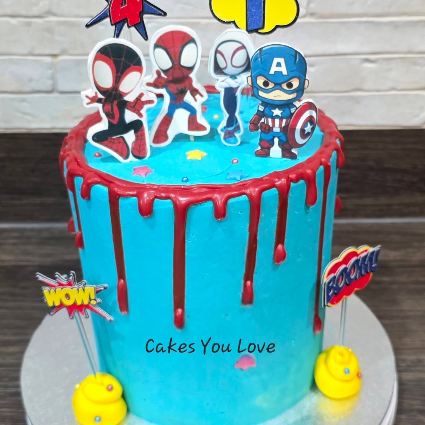 Two birthday cakes a week apart. The decorations are all edible. Printed on icing sheets and backed onto flower paste for stability.
The names and ages are made on a cricut and are non edible