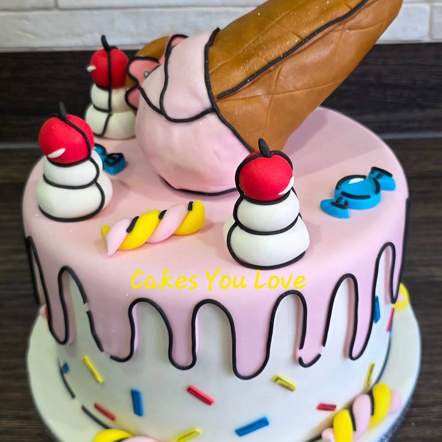 My first try at a cartoon style cake. I've been wanting to try this since forever! Love how it all turned out. The ice cream was a bit of a challenge and something to work on for next time