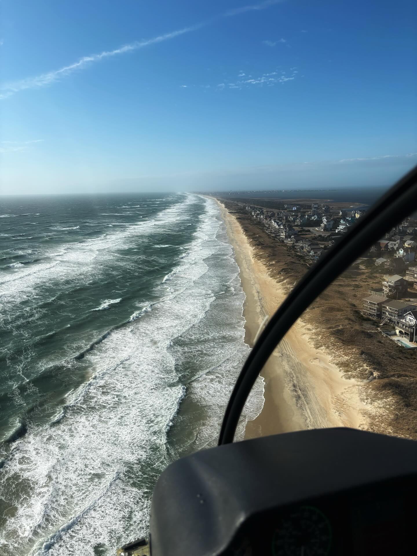 That is an angry ocean out there today! Many thanks to Captain Larry who swooped in to Frisco Airport to give me and Rammy a ride across the inlet when the ferries stopped running. If you’ve ever wondered how a cat likes flying in a helicopter, let me assure you that it’s not in their top 10 list of things to do 😬