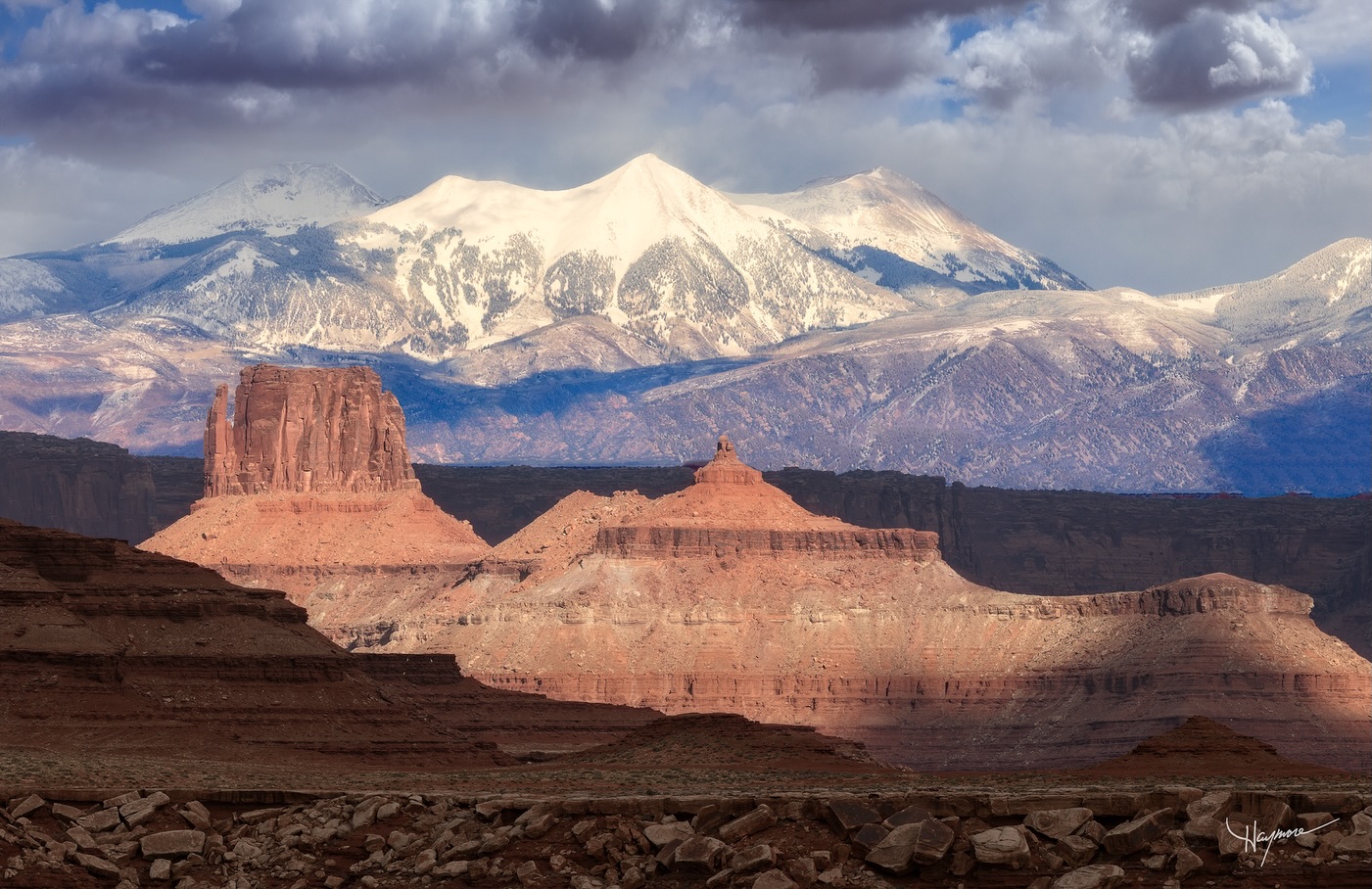 A play of light and shadow, amid white and sandstone.