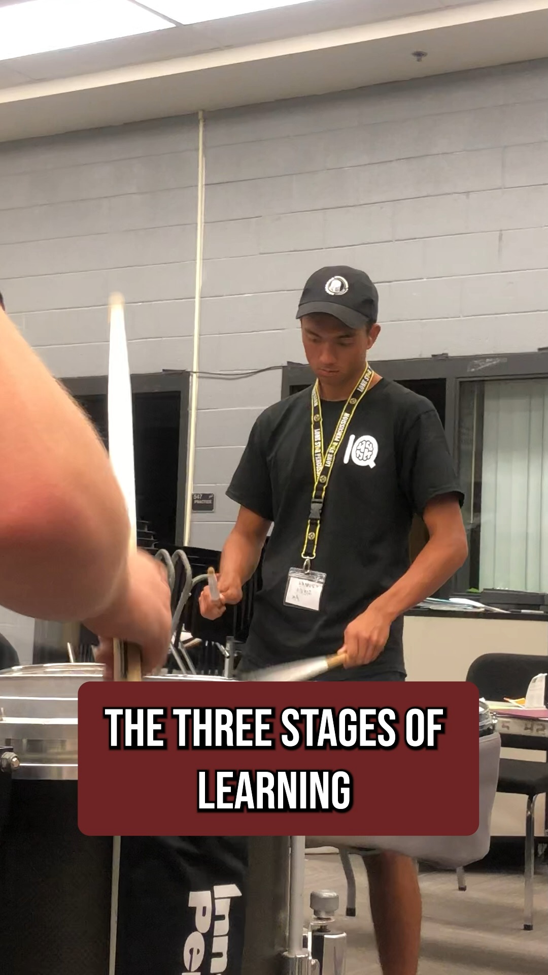 Understanding how motor learning works will completely change how you practice.
There are three stages: Cognitive, Associative, and Autonomous. Each one requires a different approach.
Stage 1: Cognitive
You're learning something new. Every detail requires intense mental focus—where your hands go, what the sticking is, how the rhythm feels. This stage is mentally exhausting.
Practice strategy: Short blocks (5-10 minutes), high focus, slow tempo, immediate feedback. Record yourself, use a mirror, get feedback from instructors. Accuracy is everything here because you're establishing the pathway.
Stage 2: Associative
You've got the basic movement down. Now you're refining—dialing in dynamics, sound quality, and consistency. This is where you'll spend most of your practice time during the season.
Practice strategy: 15-30 minute blocks with lots of reps. Gradually increase tempo. Add complexities like sticking, dynamics, or drill. Progressive overload strengthens the neural pathway.
Stage 3: Autonomous
Reps feel automatic. You don't have to think about it anymore. Now you can focus on musicality, performance, playing clean with others, and body visuals. This is the end goal for show performance.
Practice strategy: Maintenance. Keep the reps up to keep neural pathways active. This is why you play your warmup packet all season—to keep autonomous skills autonomous while building autonomy in the show.
Know what stage you're in. Practice accordingly. Progress faster.
#drumsmart #iq #percussioniq #snare #quad #percussionist #wgi #dci #indoordrumline #drumline #drum #drumcorps #music #marchingarts #drummunity #marchingpercussion #marching #snaredrum #tenordrums #marchingsnare #bandsofamerica #percussioneducation
