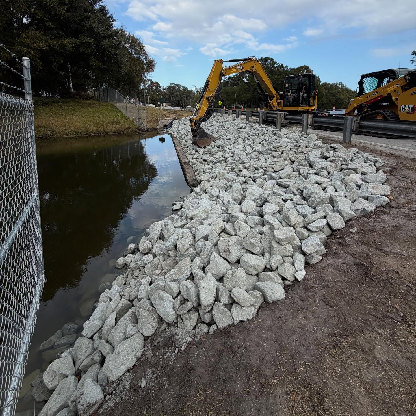 Slope stabilization in progress 🚧
We’re restoring a heavily eroded roadside slope by regrading it back to its proper profile, installing stabilization fabric, and finishing with rip rap. This process helps prevent future erosion and protects the roadway for the long haul.
#erosion #erodedslope