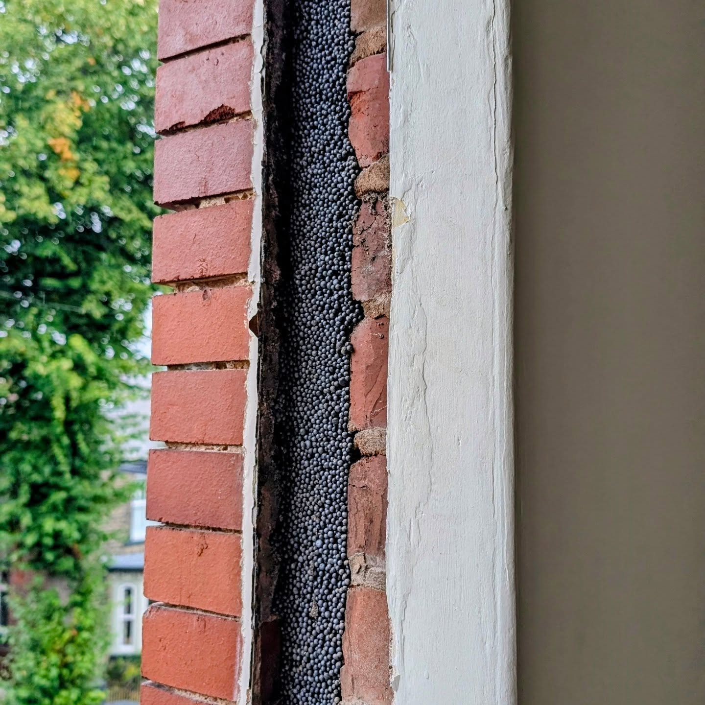 Retrofit cavity wall insulation