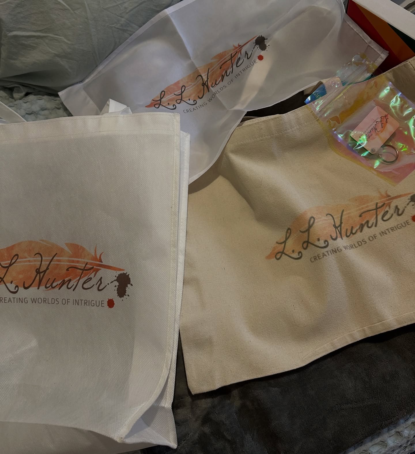 Some of my birthday gifts! I told @rrp1984 to use my logo to test on different products with the sublimation printer, and they came out amazingly! I also got a mug. So hopefully soon i’ll be able to sell branded mugs, and have tote bags and keyrings available at events
#indieauthor #smallbusinessbranding