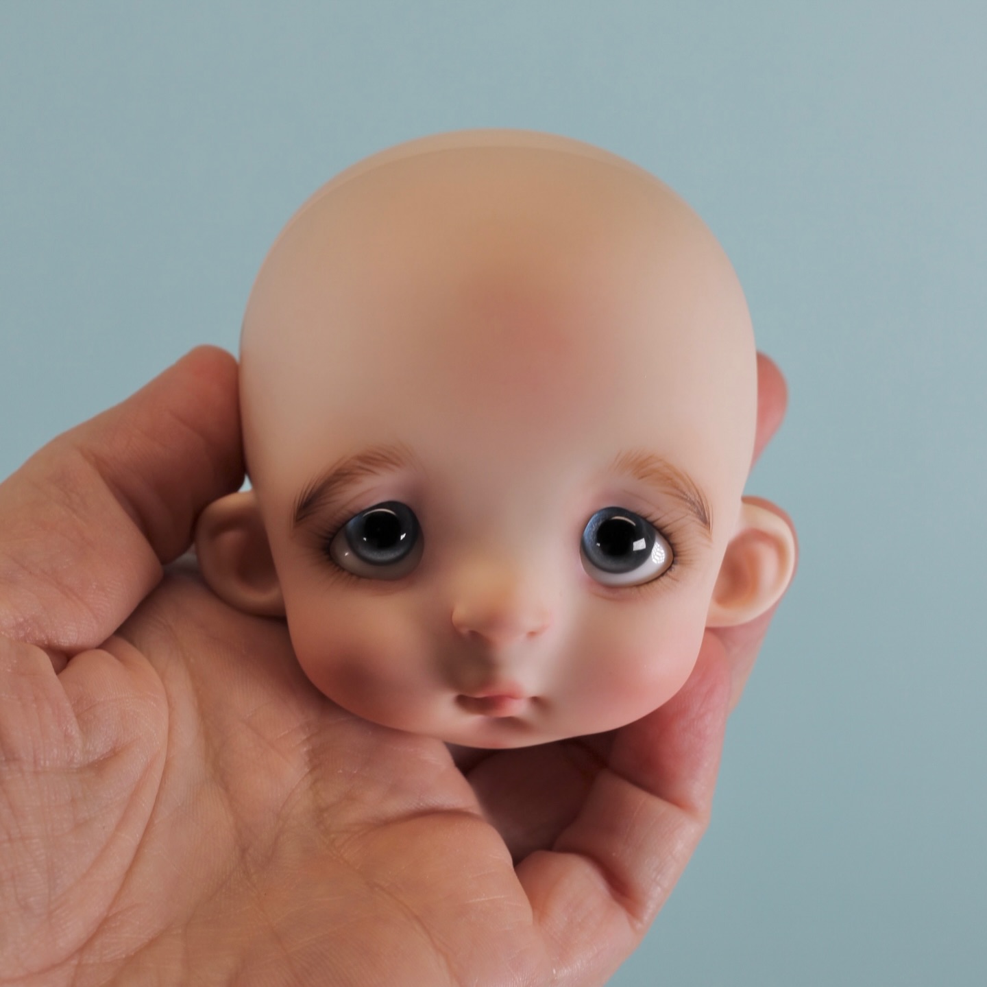 A new doll coming soon, in the second picture you can see it close to Bunny doll head. Tomorrow will be the last day to order Bunny. Check the website for all details. #lindamacariodolls