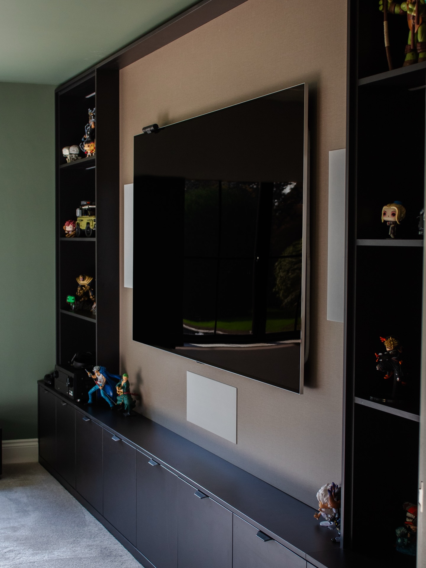 A bespoke Weber Creative Interiors media wall, combining sleek built-in storage, integrated speakers, and soft upholstered backing to create a clean, considered focal point for the room.
#BespokeInteriors #MediaWall #CraftedSpaces