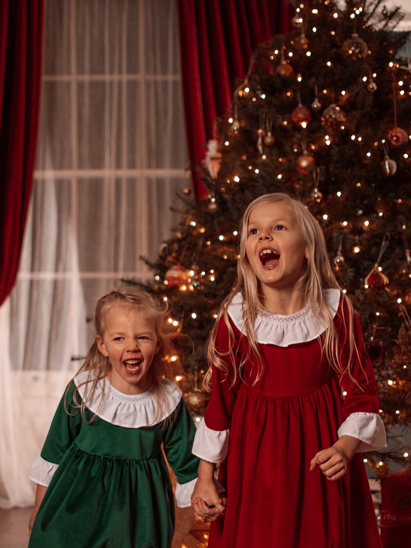 The Christmas tree stays. It’s not negotiable! 😳
Today is Russian (Orthodox) Christmas — a quieter, more spiritual day, celebrating the birth of Jesus Christ.
I know for many the festive season is already packed away. Trees are down, lights switched off. But our Christmas tree is still standing. Today we gather once more — not in a big way, but in a meaningful one. A quiet family meal, the fire on, something sweet baking, tea in our hands, and hearts full.
I wanted to share one of my very favourite photoshoot of my own children. Taken years ago, when I was just returning to photography and they were still so tiny.
I found these beautiful dresses for them that Christmas, and we photographed this moment at home, by our tree. There was something truly magical in the air — simple, soft, real.
For those celebrating today — Merry Christmas. May it be gentle, peaceful, and filled with light ✨