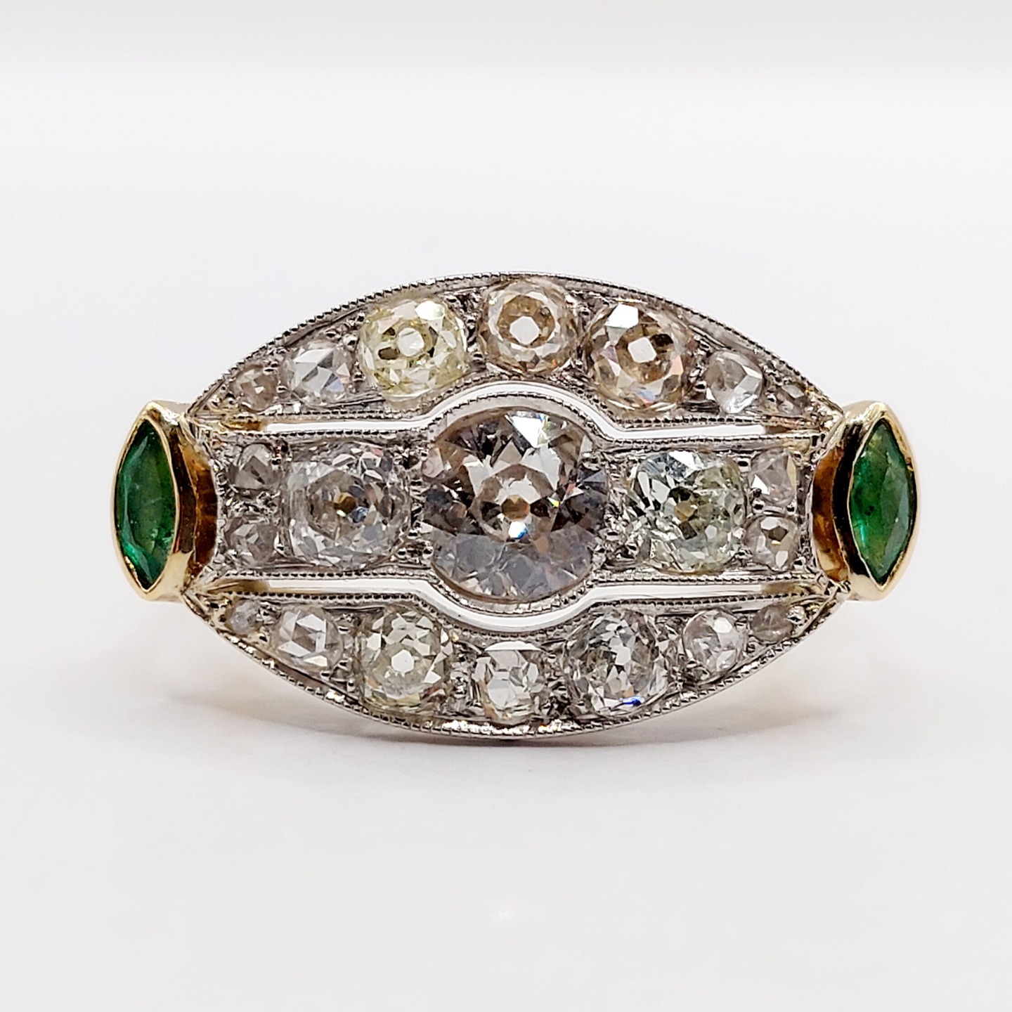 ///Sold/// Art Deco inverted marquise ring 18k gold and platinum set with 2.15 carats of old mine cut diamonds flanked by marquise cut emeralds
PRICE : 3090€
Magnificent goldsmith work
Size: 54.5 FR / 7 US
Weight: 6.91 g
Main diamond size: approximately 6.2 mm (estimated at 0.85 carats)
Secondary diamonds (x2): approximately 4 mm (estimated at 0.50 carats total)
Tertiary diamonds (x4): approximately 3.4 mm (estimated at 0.60 carats total)
Small diamonds (x14): from 2.5 to 1 mm (estimated at 0.20 carats total)
Diamonds in good condition, small inclusions visible under magnification
Head size: 14.2 x 25.3 mm
Micro scratches from use
Hallmark difficult to read
#frenchjewelry #diamond #diamondring #antiquering #victorian #victorianring #marquisering #augustusjewels #vintagering #daisyring #daimondhaloring #toietmoi #toietmoiring #baguetoietmoi #oldminecut #frenchjewelry #oldminecutdiamond #rosecut #rosecutdiamond #omcdiamond #oldminecut #oldminecutdiamond