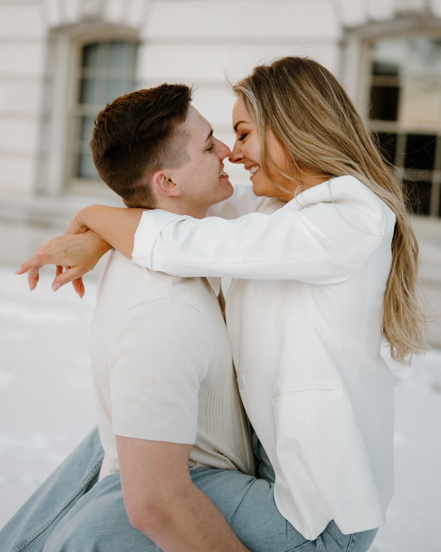 I’m so excited to share some photos from Kenna and Luke’s winter engagement session at the Wisconsin Capitol! The sun was shining, there was an absurdly dreamy late winter sunset that created long shadows and made Kenna’s engagement ring shine. We explored outside the capitol in the snow and I had so much fun capturing gorgeous images of these two. Consider this your sign to have your engagement photo session at the Wisconsin State Capitol!
Wisconsin Capitol Engagement Photos in Winter | Madison Wisconsin Engagement Photographer | Winter Engagement Photos | Snowy Engagement Photos | Madison Wisconsin Wedding Photographer | Wedding 2026