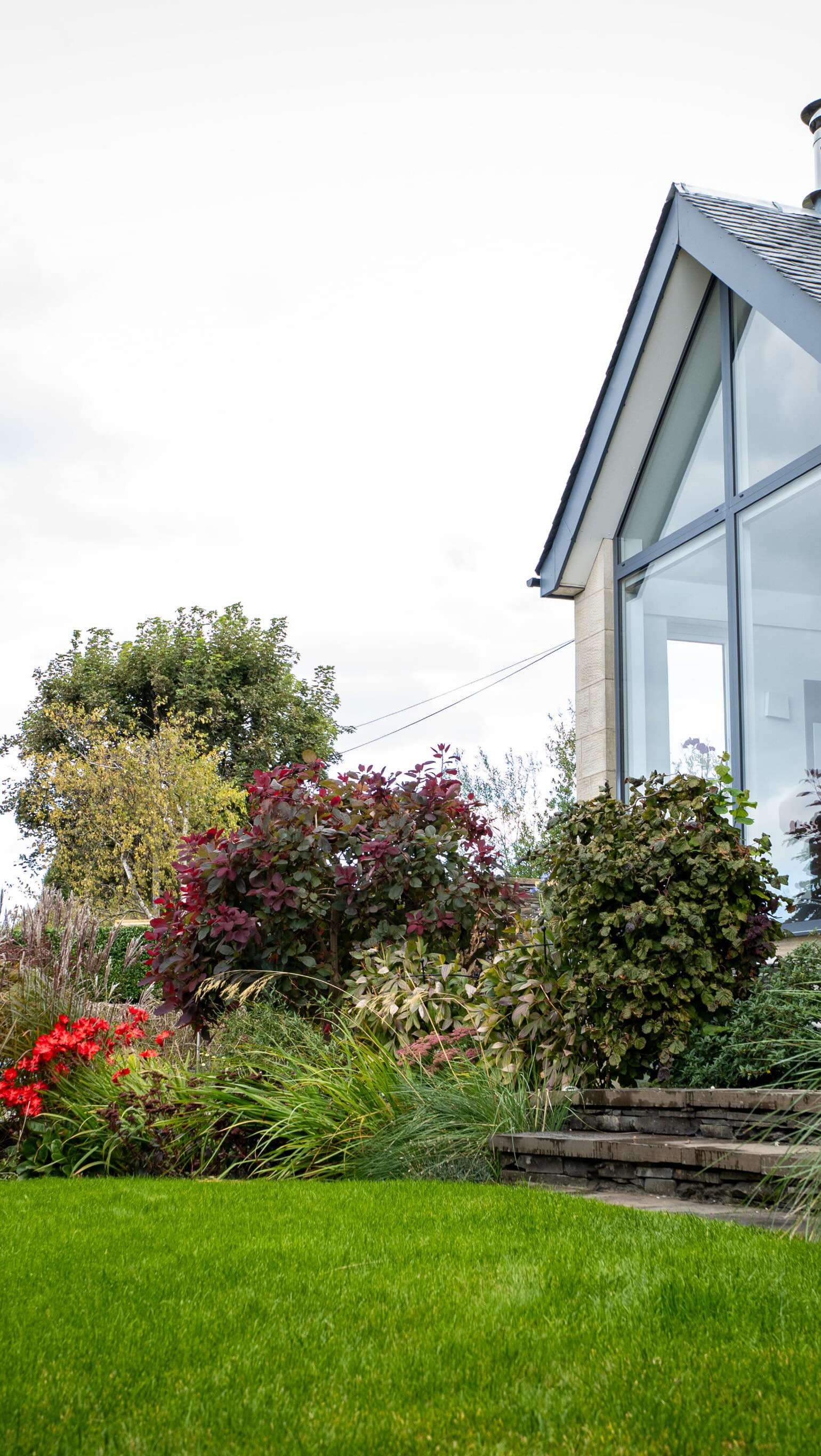 ✨ Project Spotlight 5: The Milngavie Garden ✨
A private garden retreat in Milngavie, north of Glasgow, thoughtfully crafted in 2020 with uncompromising quality at its heart. This space is defined by refined detailing, premium materials, and a calm, layered planting scheme designed to mature beautifully over time.
At the centre sits a truly bespoke feature: a handcrafted bench, carefully coped and fixed with stainless steel, topped with a Scottish oak arbor. It is a place to pause, framed by soft grasses, elegant maples, hybrid Azaleas, delicate amelanchiers, and silver birch stretching into the distance, creating depth, movement, and seasonal interest.
The planting tells its own story. Select plants have been carefully removed and others reintroduced, while others were added to enhance structure and flow. One standout feature is the cloud pruned Ilex chosen personally by the client, now flourishing after four to five years, beautifully framed by silver birch and wrapped in classic box hedging.
Every detail has been considered. From the S3i railings with stainless steel wire protecting the basement level, to Scottish oak posts, a Scottish slate roof, and Kithnest stone walls that anchor the garden in its surroundings. The result is a space where craftsmanship and materials work in quiet harmony.
This project reflects what happens when clients trust the process and insist on the highest standards. Quality, precision, and attention to detail that truly stands the test of time.
We love to re visit gardens year on year and they only get better with age.
Professional photography and videography by @_rthomson
Design by @mhairiauld
🌿 MacColl & Stokes Landscaping
📞 01360 622855
📨 info@ms-landscaping.co.uk
#Landscaping #GardenDesign #PrivateGarden #Milngavie #GlasgowGardens