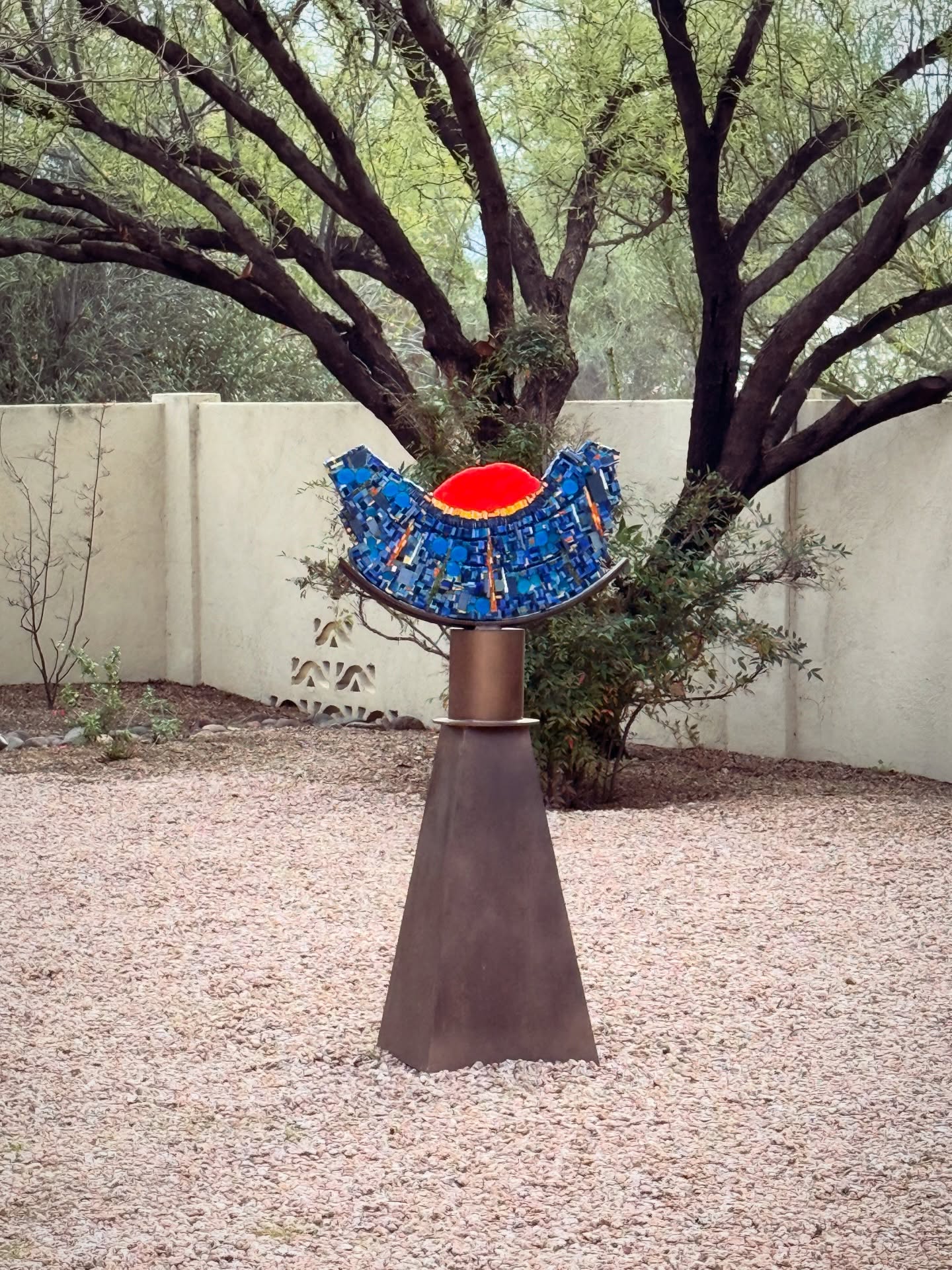 Mosaic Sunset using Italian smalti adds some color to a beautiful backyard