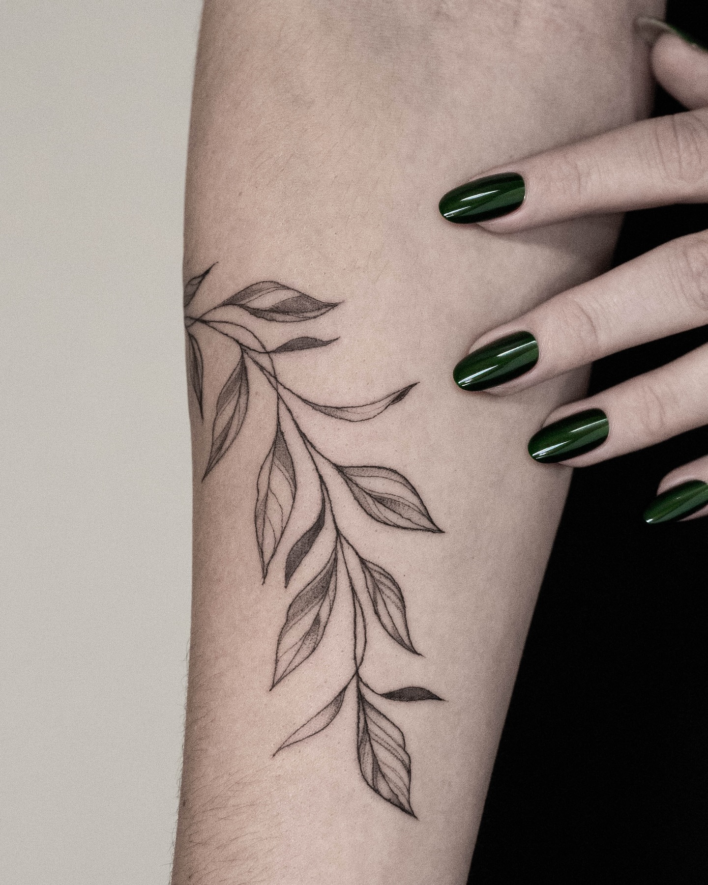A delicate botanical piece for Lotte, flowing naturally with the shape of the arm. Fine lines and subtle shading to keep the tattoo light, balanced and timeless.