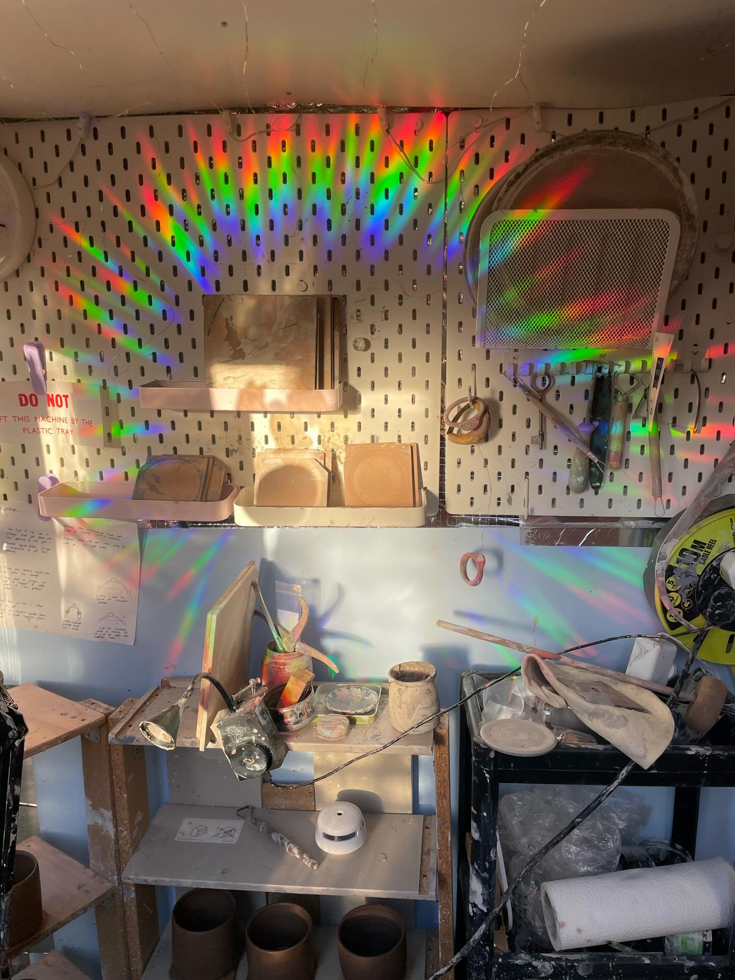 A bit of making and a bit of moving, both featuring rainbows (shed rainbows courtesy of @naomipwilkinson stickers) #jenmakespots #montpelierbristol #naomiwilkinson