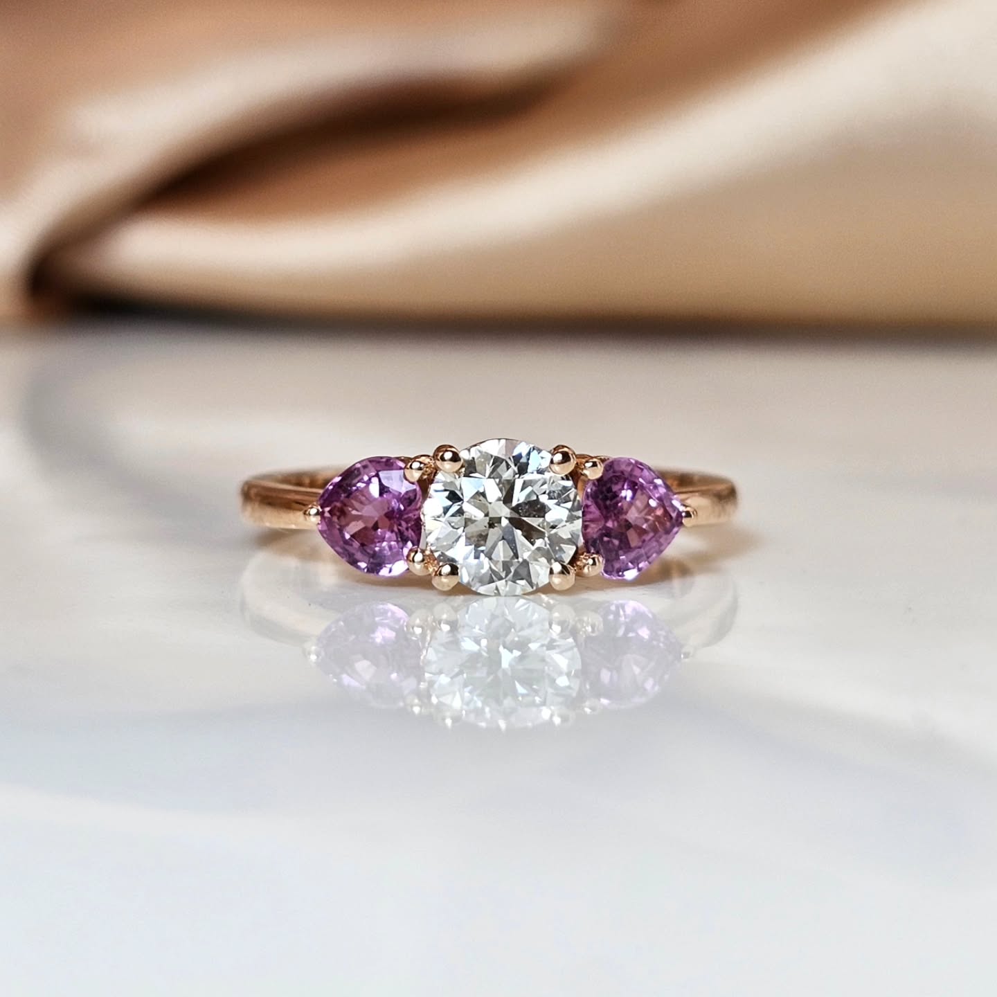 The "Love ring"
Natural diamond and natural pink sapphire hearts, set in 14k rose gold.
Romance at it's best!
www.heimanjewelry.com