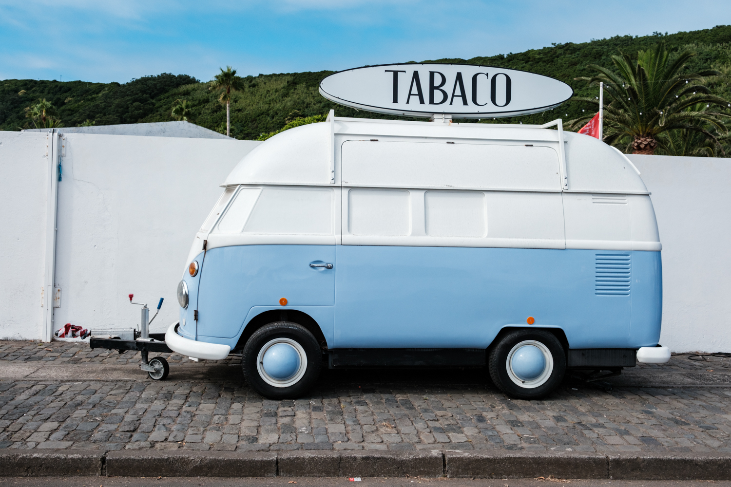 Years ago, one photo changed my way of thinking about wildlife, photography, ethics, my creative desires, and eventually my life. All photographers, including myself, must recognize that the images we share may influence others. For me, if one of my photographs inspires change in someone, in thinking or actions, that would be the ultimate compliment. I am sure other photographers feel the same. Photographs and photographers leave impressions on us. They inspire us. Today, I am sharing a photo I created while in the Azores last summer. The moment I saw this VW van that had been converted into a vendor's trailer, I had to photograph it. There is nothing earth-shattering about this image, yet it made me smile and think of my friend Bob Watts. He would have loved the soft light on the van and the color. He would have done what I did, pull over and taken a photo or ten. If the owner had been there, Bob would have met them and shared an excited conversation and stories. The owner would have felt like they knew Bob forever. If you know Bob, you understand all I am saying and all I am going to say. If you don't know Bob, you are missing out on an excellent human being, and arguably the most enthusiastic photographer and supporter of photography I have ever met. Bob spent 37 years working for Nikon and is now retired. Despite a long career and retirement, he remains a big, happy, busy, productive, soft-spoken, curious kid. For several years, he has worked on a project featuring photographs from walks in his hometown of Newburyport and other destinations. If you look at his photographs, you will see he is drawn to stories, history, people, light, color, tones, shapes, lines, houses, buildings, bridges, and, well, everything. That is the joy of Bob Watts, his wide-eyed appreciation for everything and his gentle, genuine sincerity toward it all. We can all learn from him; I have. Bob, my friend, please know your relaxed walks, photographs, and appreciation of life’s many details remind me to slow down and look at everything.
Photograph What You Feel
Fuji XT5
Fuji 16-55mm f2.8II Lens
ISO: 400
APT: f5.6
EXP: 1/2000th of a Second Hand Held While