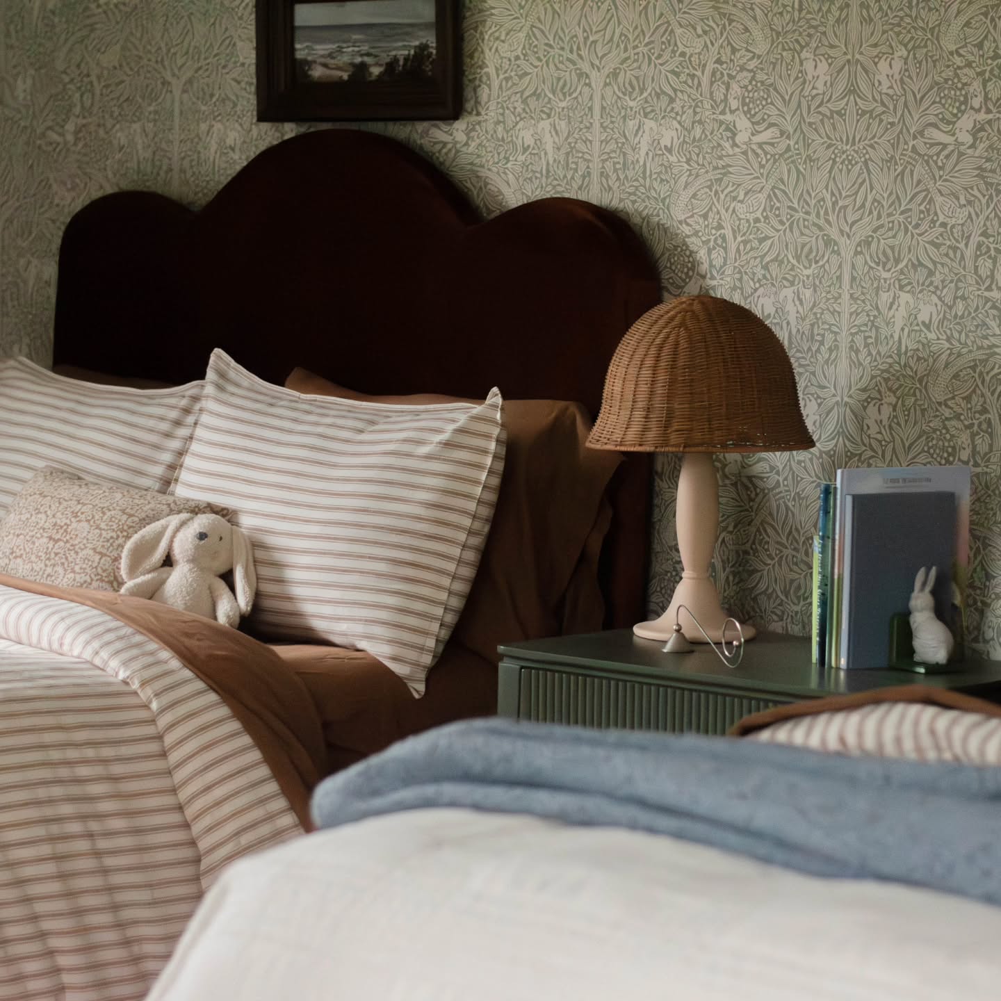 A fun sleepover room designed for our clients grandkids to spend the night. We choose a whimsical wallpaper filled with tons of animals to spot when drifting off to sleep. We incorporated lots of fun and playful curves, and the comfiest parachute bedding to sink into. Grandpa said it best after we revealed the space to him....."Makes me want to curl up and take a nap right now".
Design @cassieklassenhome
#nortonshoresinteriordesign
#kidsroom
#westmichiganinteriordesign
#parachute