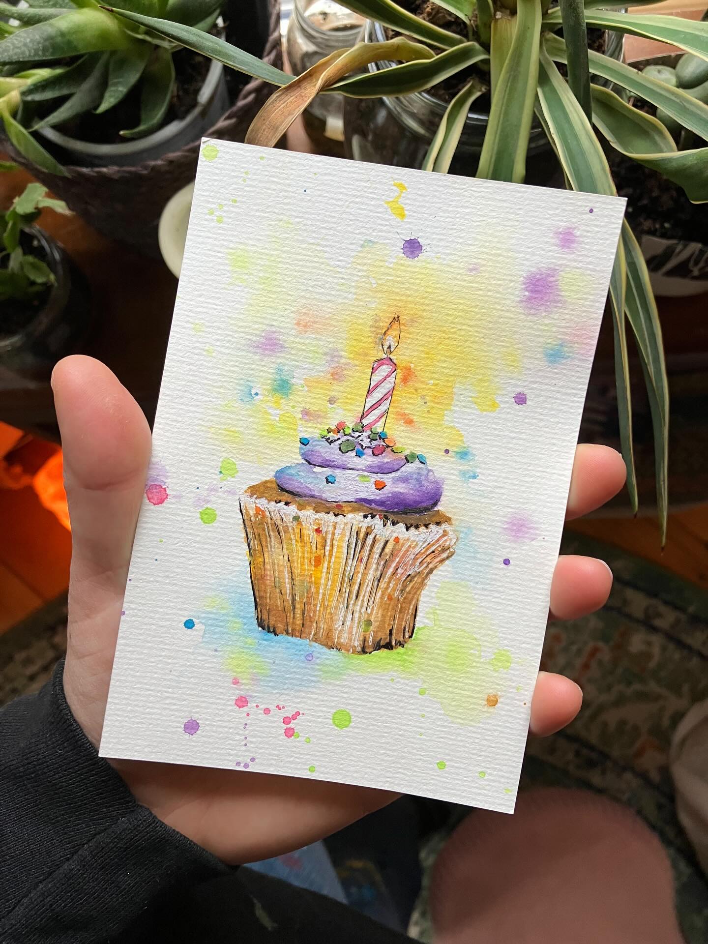 Cupcake Celebration 🎉 Peek behind the scenes in the first installment of “Behind the Brush” to get a glimpse into the creative development of this piece: https://www.adventurineartstudio.com/post/behind-the-brush-painting-the-2026-cupcake-celebration-card #blog #art #artist #cupcake #creativity #artprocess #stationary #birthday #celebration #hope #birthdaywish