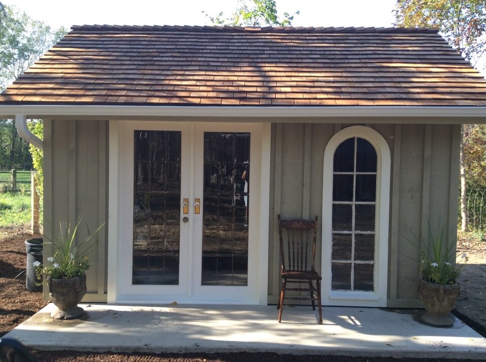 Beautiful custom wood shed crafted by Maximus Craftsmanship. Pine board and batten siding, cedar shingles, salvaged arched windows and salvaged doors. You can’t buy this anywhere, it must be made. Get it made by the best, contact us to build your dream shed.