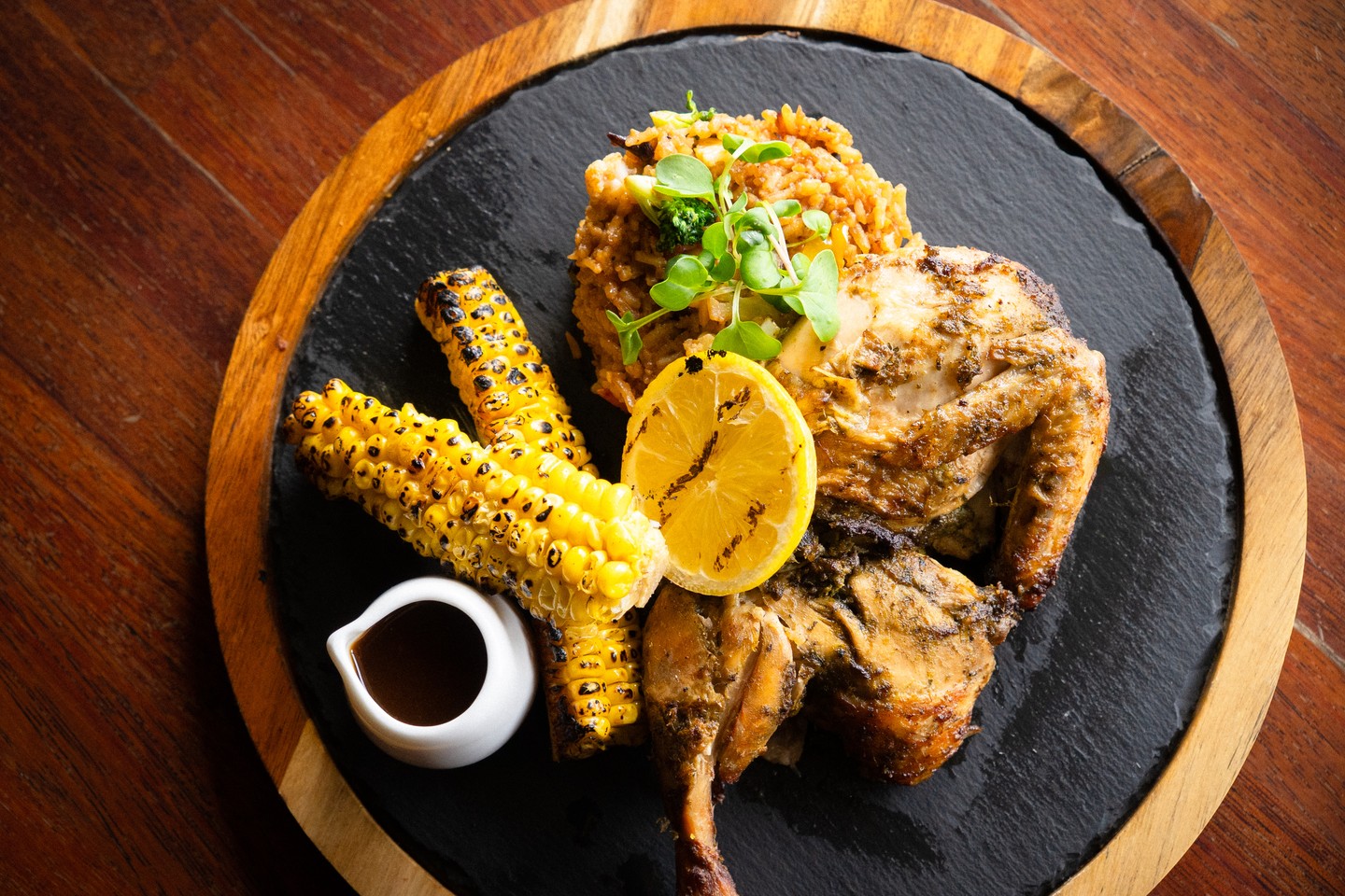 Half free range roast chicken, jerk spiced, bourbon jus, pinto bean and vegetable fried rice, corn ribs, chilli and lime butter - Vibrant flavours from the summer menu.
.
.
.
.
#trentham #hepburnshire #daylesfordmacedonlife #macedonranges #cosmotrentham #thecosmopolitanhotel #onehourout #onehouroutofmelbourne #melbournefoodie #daylesfordmacedonlife #macedonrangeswine #countryvictoria #regionalvictoria #visitmacedonranges #visitvictoria