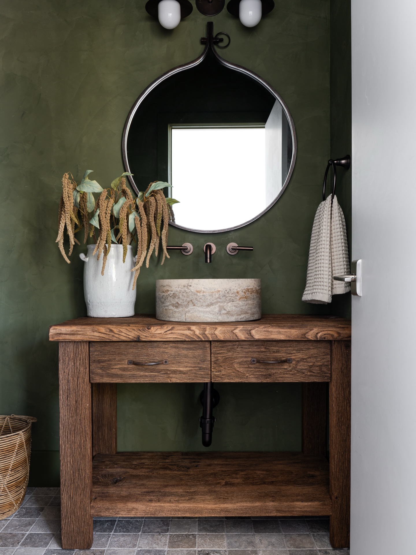 One of our favorite transformations to date ✨ this bathroom may be small but she is mighty. How incredible is the earthy green roman clay from @portolapaints ? Our goal was to create a moody space with tons of texture, so we brought in different materials for every surface with a focus on organic and natural surfaces. Absolutely love how this remodel transformed this dated bathroom into something magical!
Tile by the fabulous @timelesscreationstile
Photos by the very talented @sophiawikoffphoto
#boiseinteriordesigner #boisegeneralcontractor #boise #remodel #boiseinteriordesign
