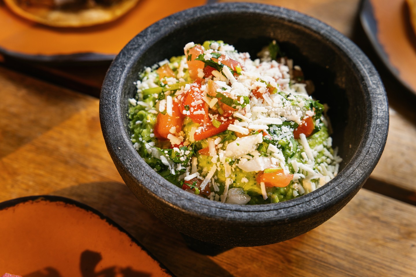 come enjoy our guacamole and chips appetizer 🥑 a fresh, zesty favorite made with onions, toma....