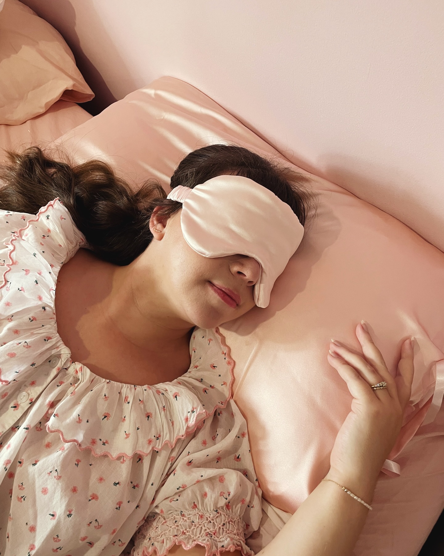 I really felt these eye masks needed some photos on a person so I got a bit out of my comfort zone and took some photos myself! And by myself, I mean I directed my husband to take the photos by posing him first and taking a photo to show exactly what I wanted 😅
I have had a bit of a complicated relationship with my face and jaw line…thanks jaw surgery! So it’s a bit of a milestone for me to feel comfortable both taking these and then posting them.
In two of my favourite @ifonlyifnightwear nighties 💕
Image description- 1. Jo, a white woman in her mid thirties, is laying on a pink silk pillowcase in a pink floral nightie and is wearing a large pink silk eye mask
2. Jo, a white woman in her mid thirties, is laying on a pink silk pillowcase in a blue check nightie and is wearing a large navy blue silk eye mask