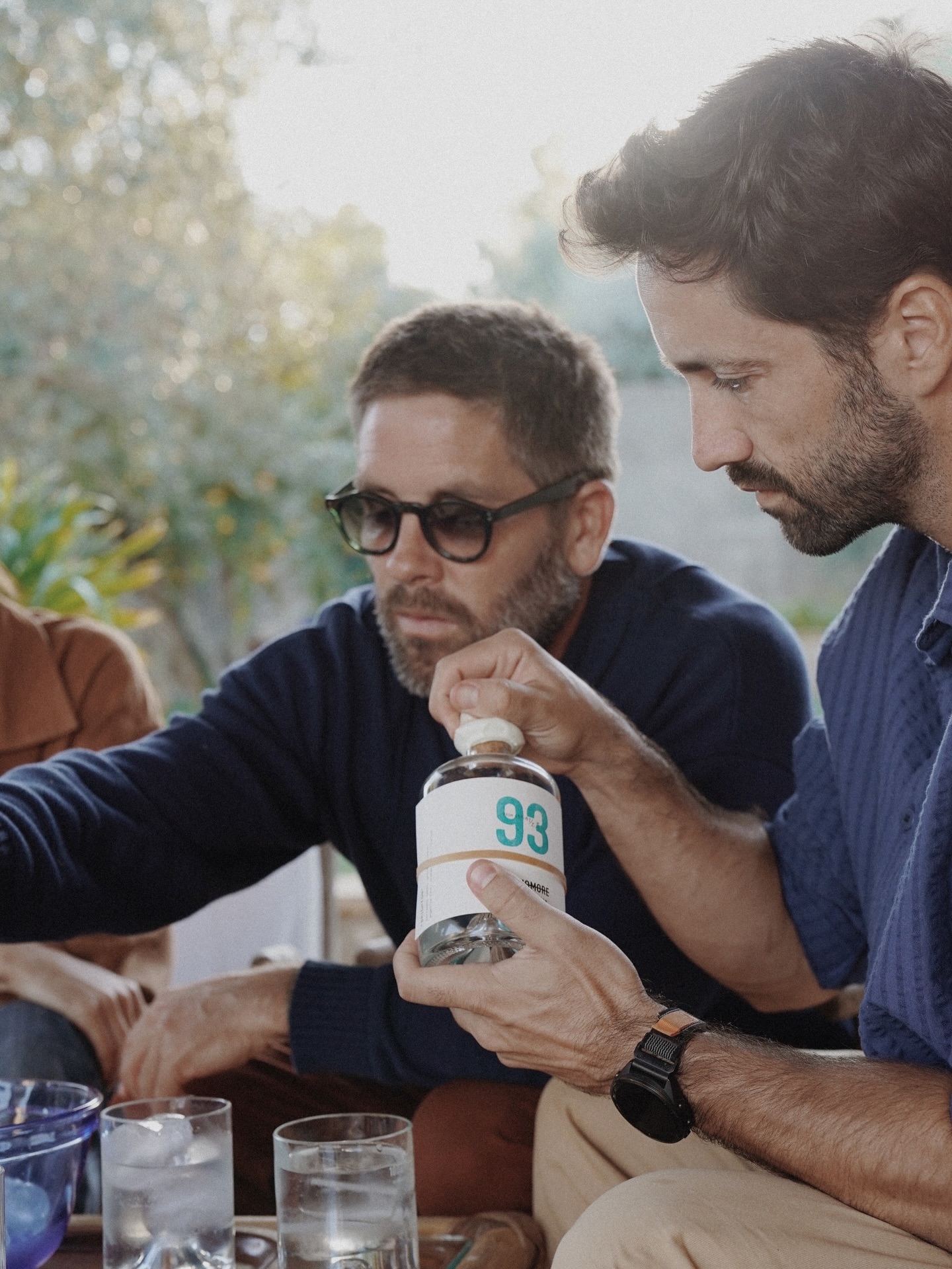 Good company + a bottle designed to be shared.