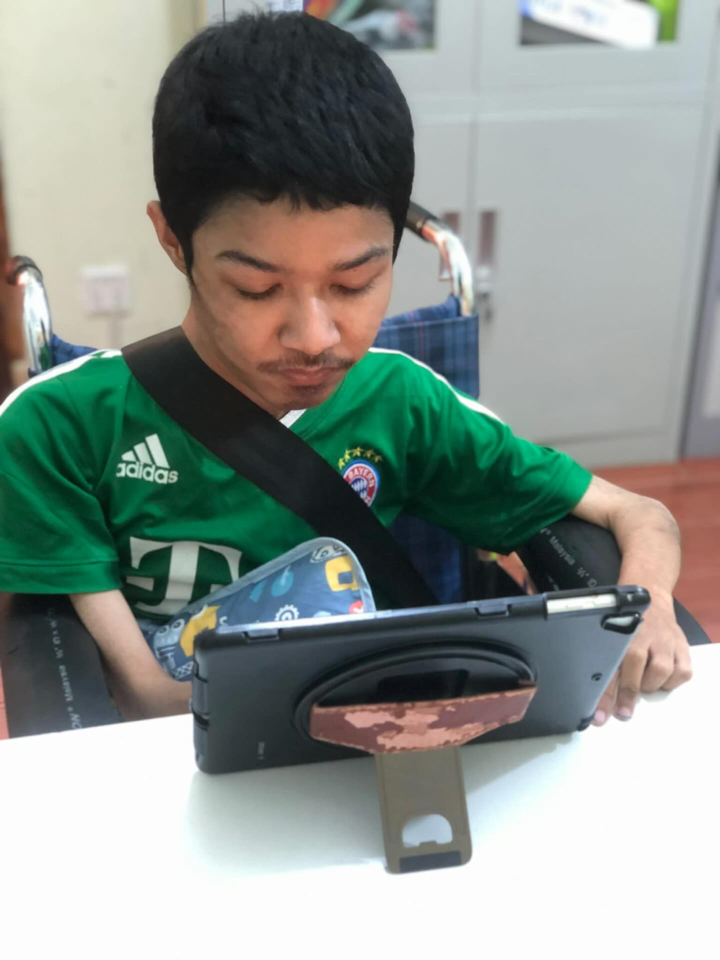 This is our 17 year-old friend, G, he has muscular dystrophy and has not been able to go to school since first grade. His parents and grandmother work very hard to support him and his younger sister. Twice each week we visit him at home and bring him to our center where one of his favorite activities is to use an iPad and go through the Bible for kids app in Khmer! We are in need of $1,800 to be able to buy three new iPads that will benefit staff and clients at Carrying Companions. If you are able to give towards this, let me know 😃