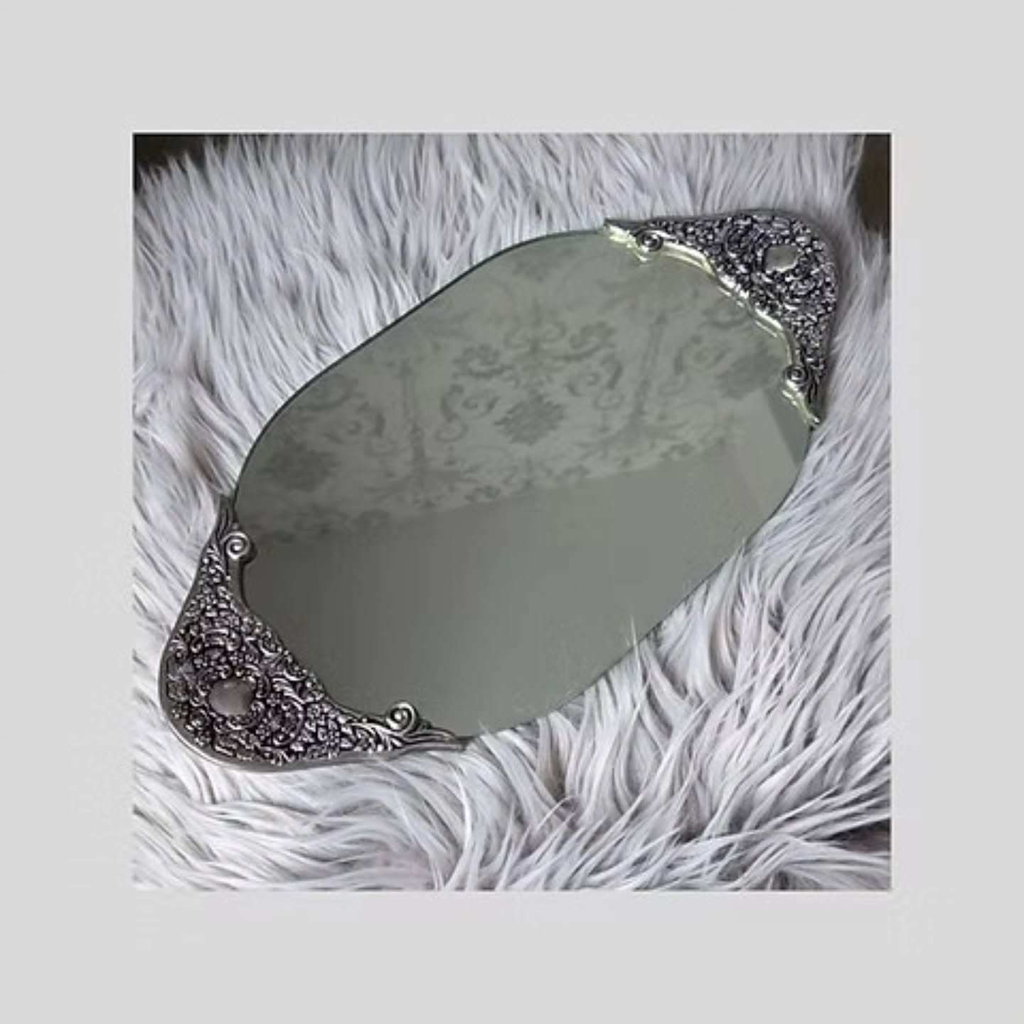 Vintage Hollywood Regency Mirrored Serving Tray with Ornate Silver Rococo Edges | https://share.google/wcADuYEsXxJHR4mqv