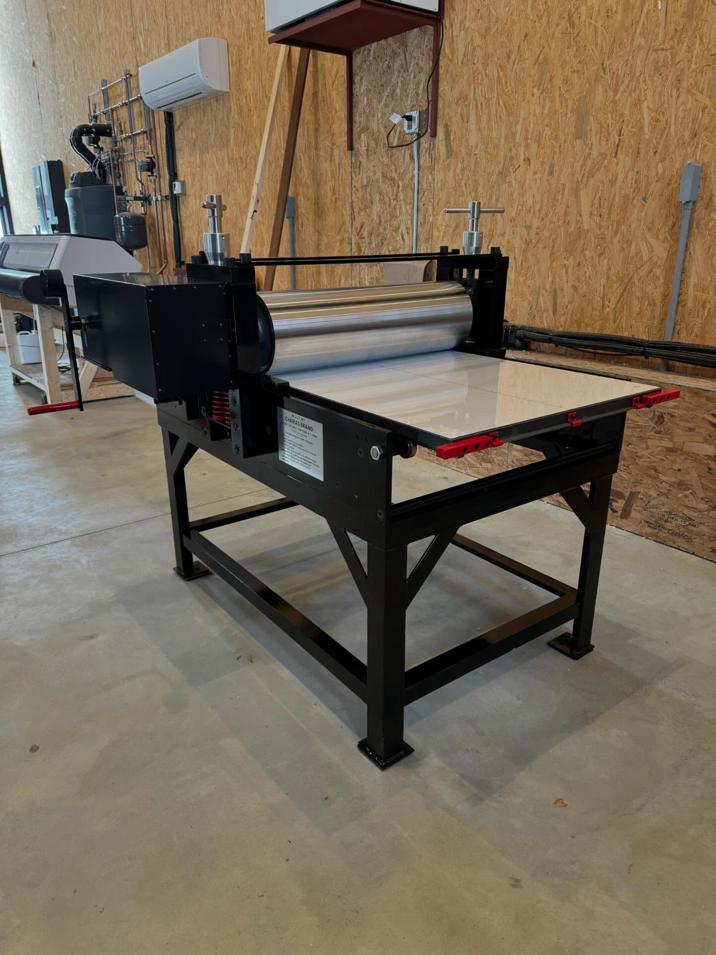 This reconditioned 28x50 Charles Brand etching press was delivered and set up in its amazing new home today in Massachusetts. When it showed up at the shop, it was quite rough - the shipping pallet broke and so did some parts. After some elbow grease, it is ready for a new life of printing. #starkpressco #pressrestoration #etchingpress #printingpress #printmakersofinstagram