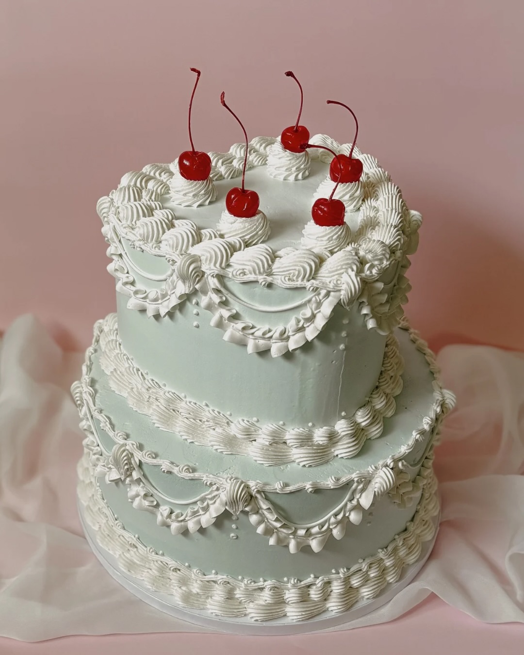 “Going all out” isn’t about excess. It’s about presence 🍒
You don’t remember what was practical, you remember how the moment felt! The energy in the room, the people gathered, the pause before the first slice was cut.
Dessert often becomes the emotional centerpiece. It’s photographed, shared, talked about, and remembered long after the day is over.
Choosing a cake that feels thoughtful and beautiful is a way of saying “this moment mattered.” Whether it’s a wedding, a birthday, or a gathering at home that deserves more than “just fine.”
Regret doesn’t come from celebrating fully. It comes from playing it safe. This is your permission to choose joy. To choose beauty. To choose something made just for you! 💕