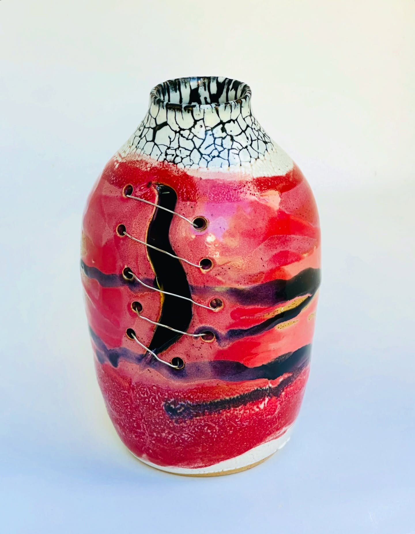 Another piece on display at @brunswickstreetgallery Small Works Art Prize Exhibition opening tonight until 17th January 2026.
Title: Woman Interrupted: Incision
This womb-shaped vessel, split and sutured with metal staples, personifies my body’s enduring dialogue with surgical intervention and repair. Pink and red evoke femininity and sacrifice; black suggests trauma and endurance; crawling white signifies sterility and healing. It speaks of pain, resilience and the perpetual reconstruction of women through surgery.