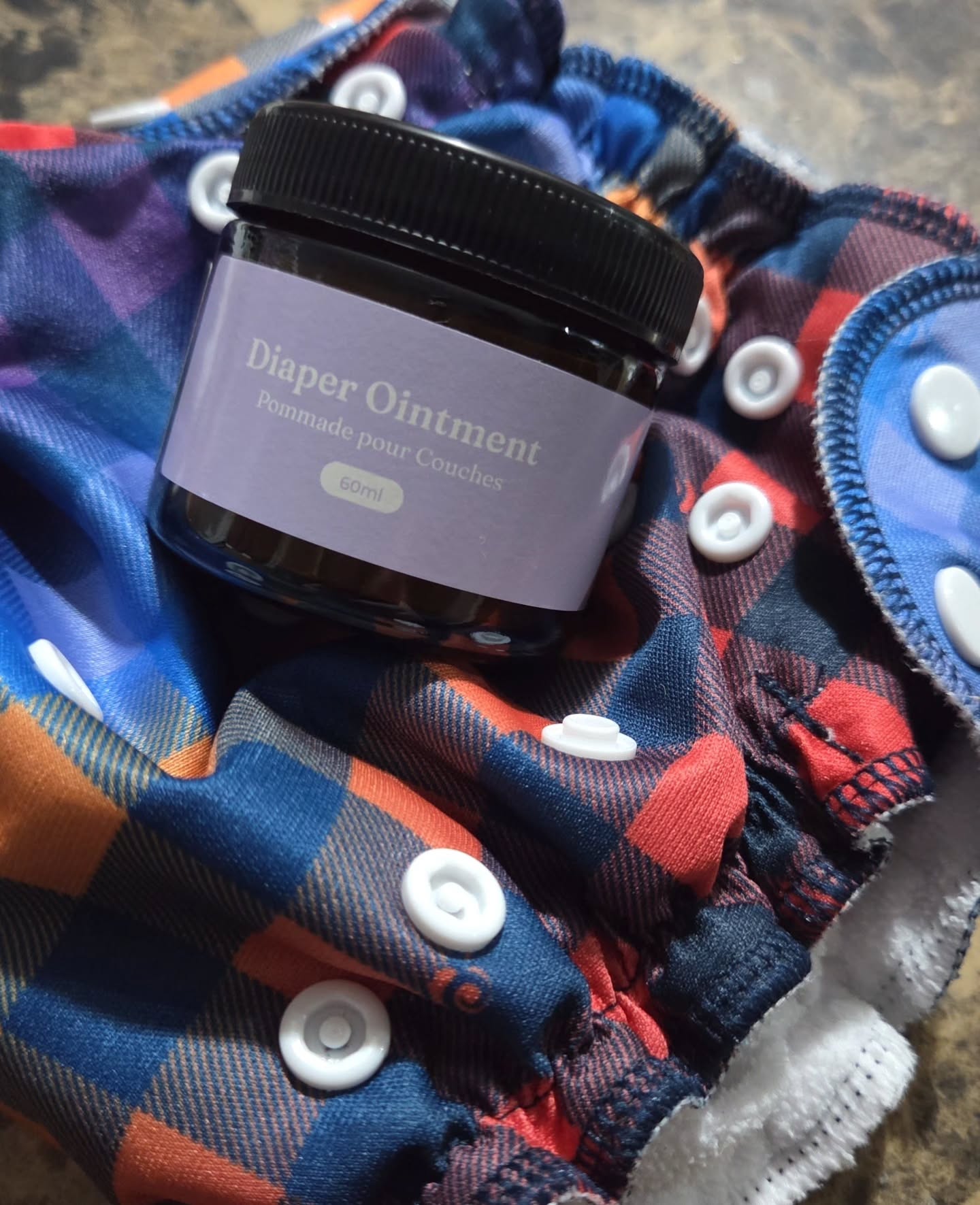 Yemaya Diaper Ointment is a natural, Canadian-made salve designed to soothe irritation, prevent moisture, and promote healing for baby's skin, often containing ingredients like calendula, sunflower oil, and beeswax, making it suitable for diaper rash, chapped skin, and other irritations, including being cloth-diaper friendly by letting skin breathe.
Key Features & Benefits
Natural Ingredients: Made with cold-pressed sunflower oil, calendula flowers, and beeswax.
Soothes & Protects: Calms irritation, prevents moisture buildup, and supports natural healing.
Versatile Use: Also effective for chapped cheeks, burns, eczema, cuts, scrapes, and other skin irritations.
Cloth Diaper Friendly: Formulated to allow skin to breathe without ruining diaper absorbency.
Handcrafted: Made in Canada with eco-friendly practices.
#baby #clothdiaper #kids #yemaya #Yemayanaturalproducts