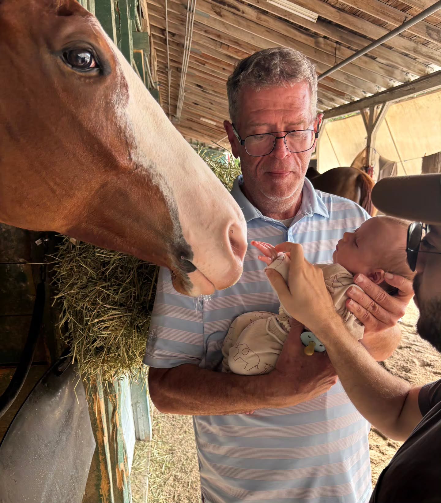 We've had a lot of great memories in Florida but this one takes the cake. New Romans addition to the family, Henry meets his first horse and it had to be the sweetest one, Miss Enchanted. A three generation photo!