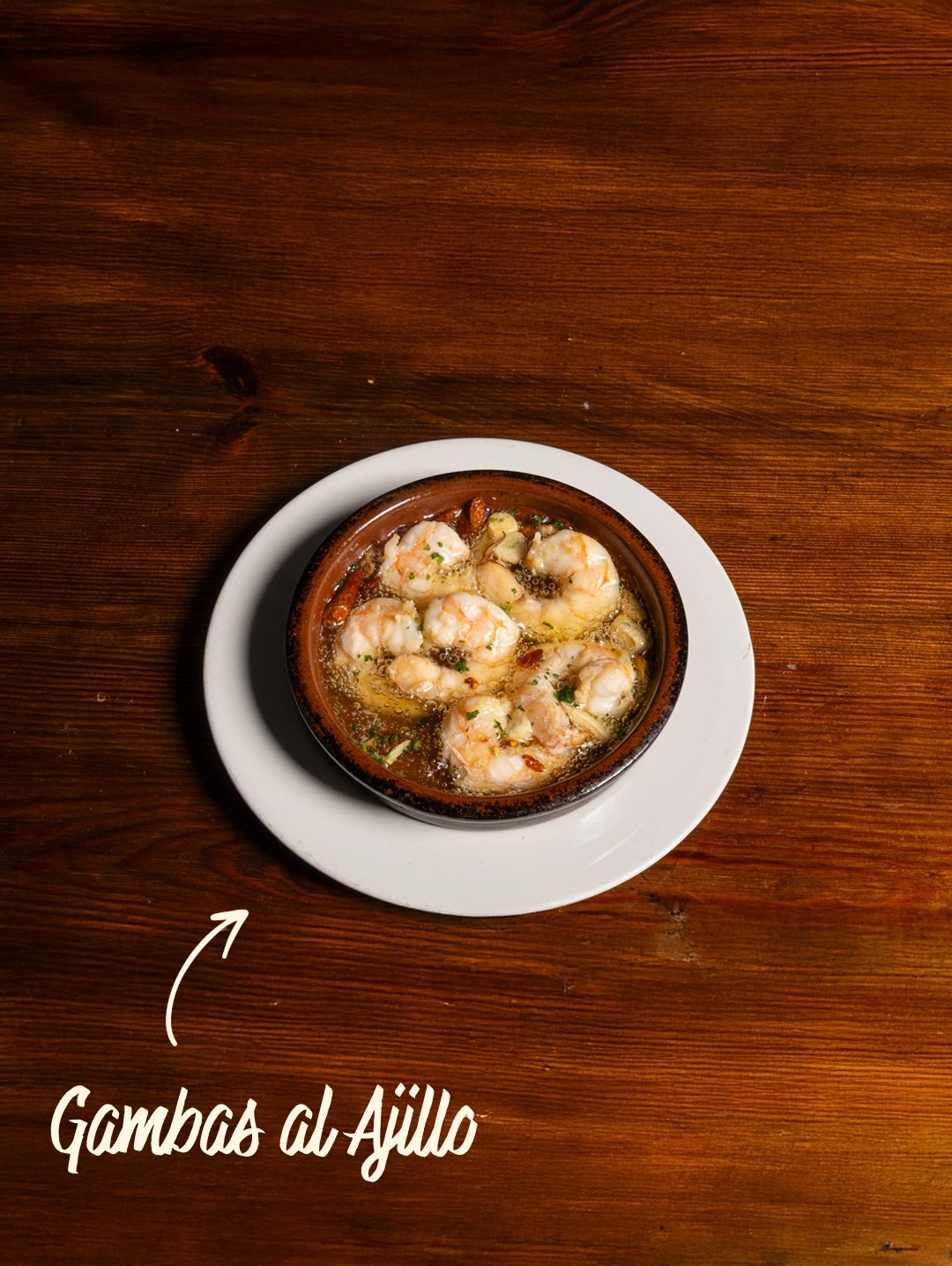 Sizzling, aromatic and full of flavour.
Our gambas al ajillo are cooked the traditional Spanish way, gently infused with garlic, chilli and olive oil to bring out the natural sweetness of the prawns. Simple, bold and made for sharing.
A true classic you’ll find across La Siesta Group, best enjoyed with good company and some fresh bread for dipping.
#lasiestagroup #gambasalajillo #spanishfood #tapas #londonfood
